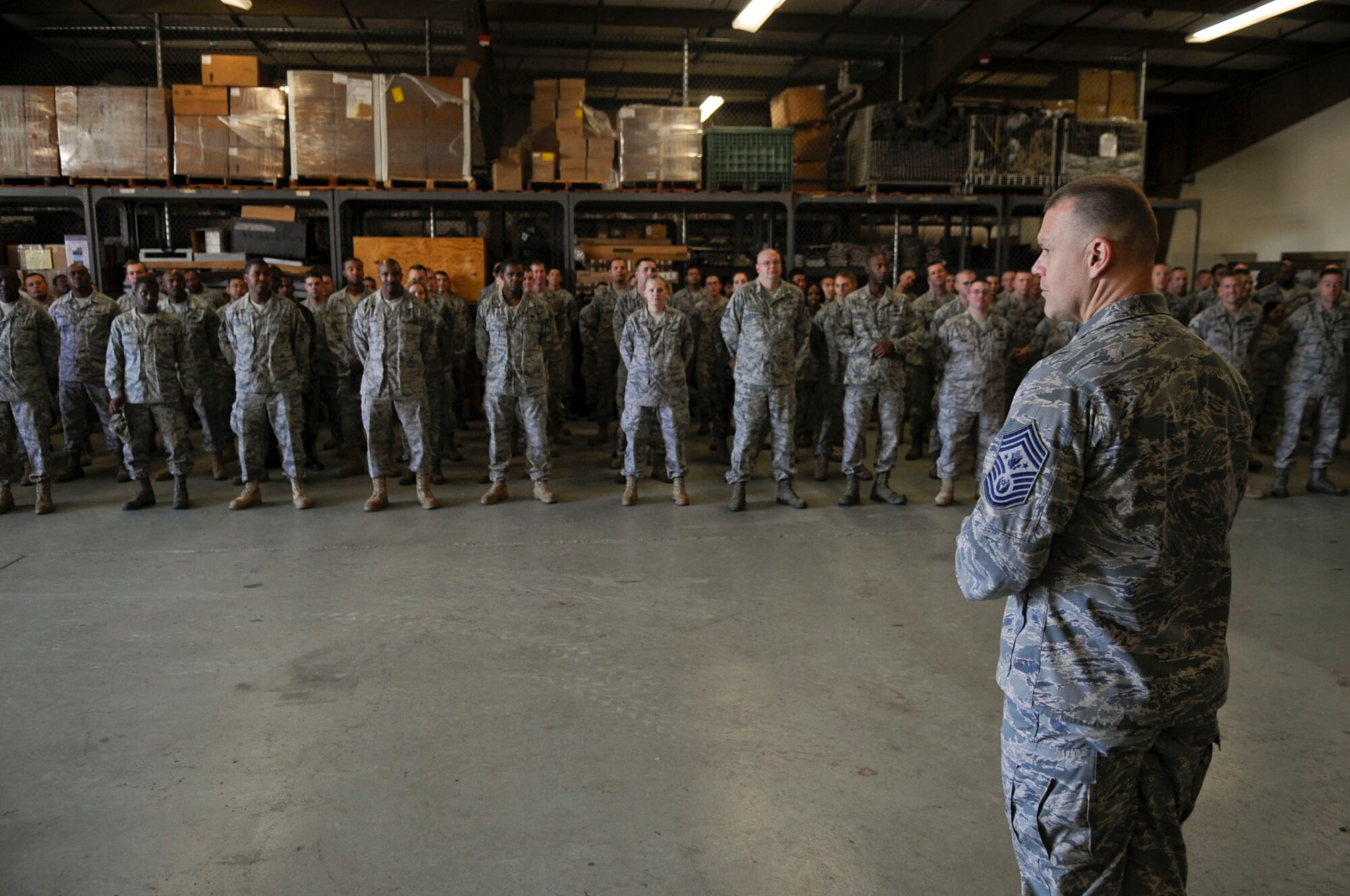 Chief Master Sergeant of the Air Force James Roy speaks with members of the 316th Civil Engineer Squadron on Joint Base Andrews Naval Air Facility Washington Wednesday during a visit.  Chief Roy used his background as a heavy equipment operator to relate to the squadron and help give them insight into the recent increase in CE deployments and special taskings.  Chief Roy also stressed the importance of spouses and family members and their role in keeping a healthy and effective Air Force.  (U.S. Air Force photo by Senior Airman Steven R. Doty)
