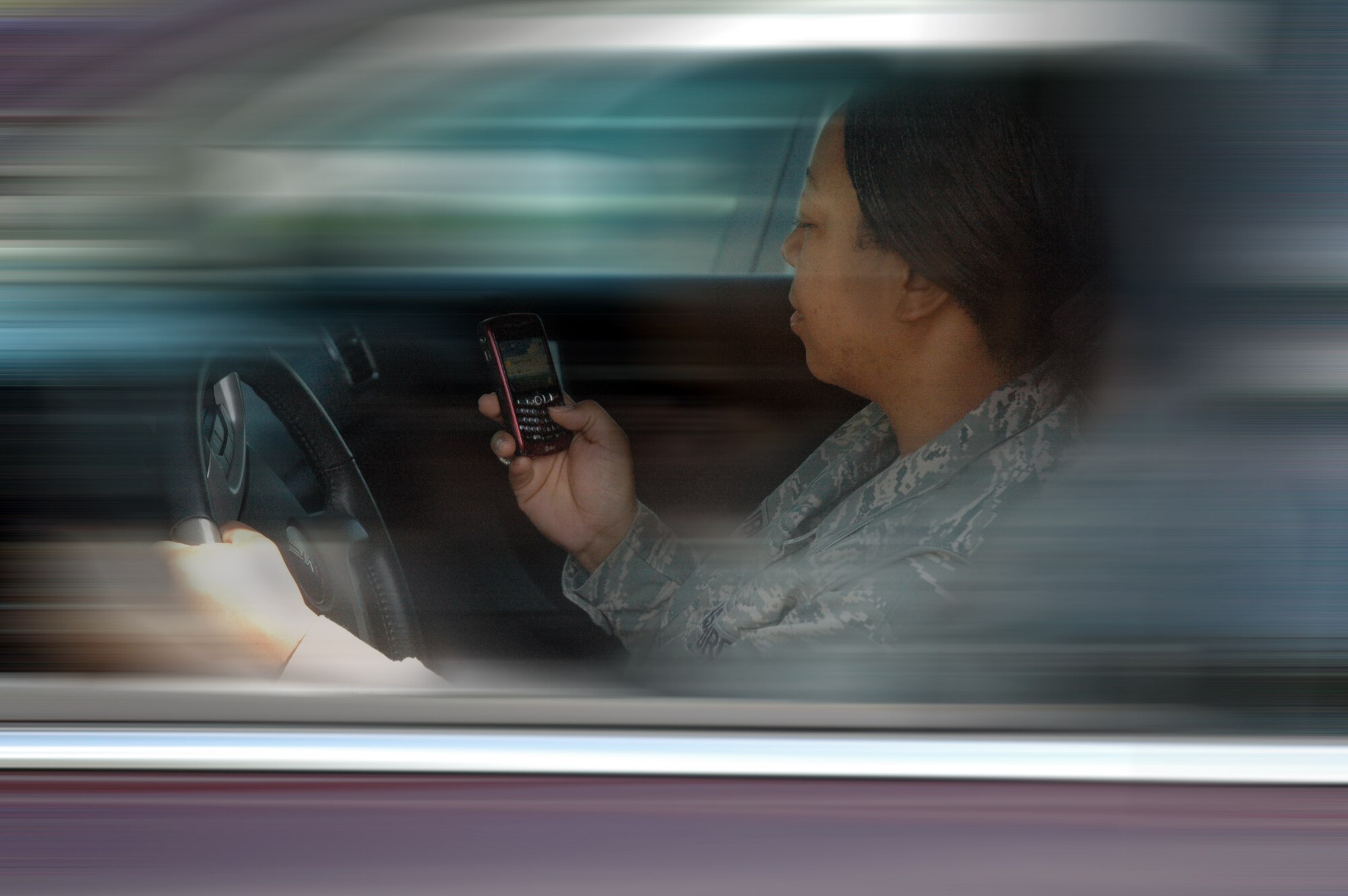 Effective Oct. 1 all federal employees, including Reservists, civilians and contractors at Dobbins, are prohibited from texting while driving in a government-owned vehicle or while driving on official business. (Photo Illustration/Travon Dennis)