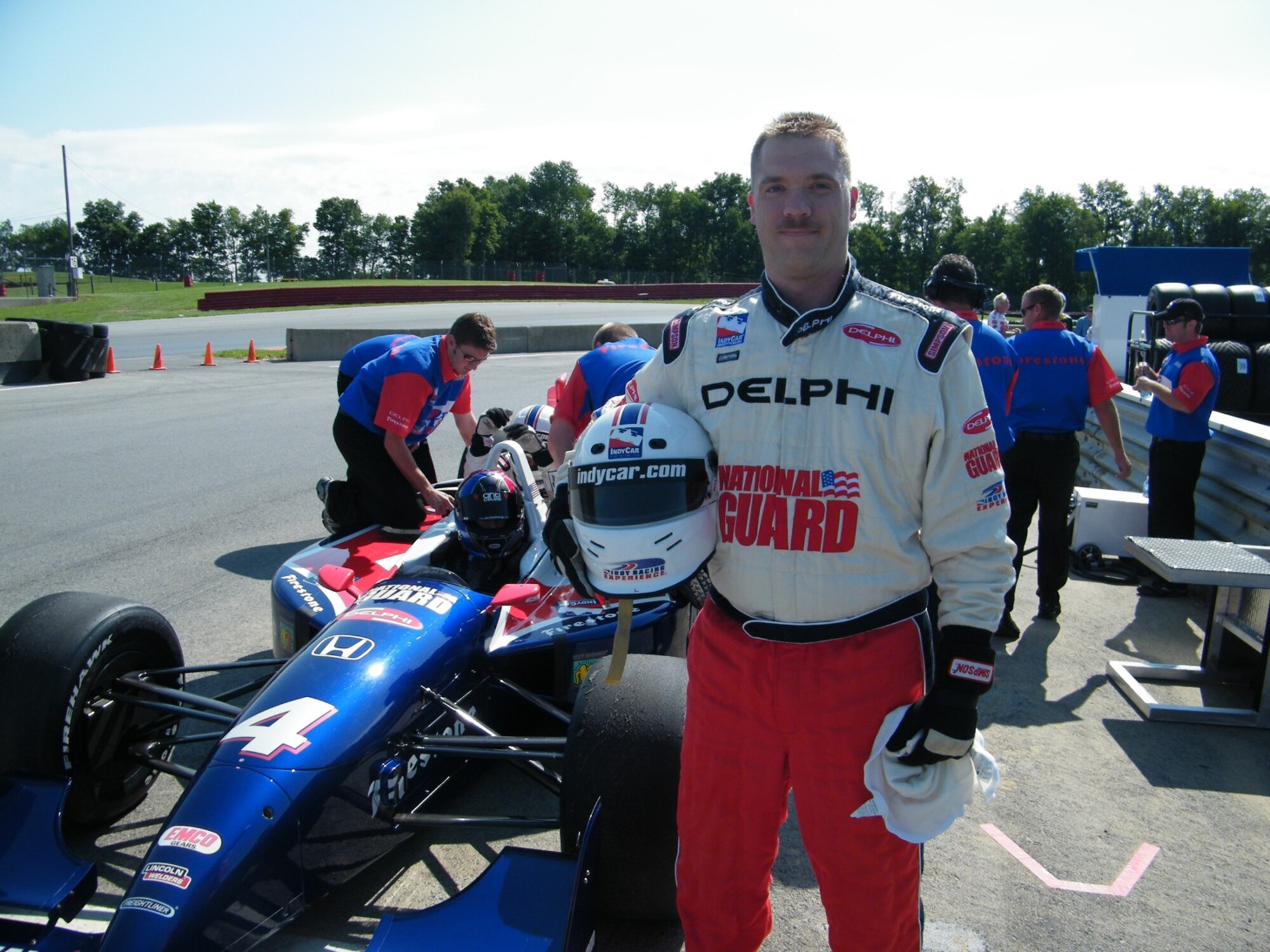 Staff Sgt. Brian Rinehart of the 178th FIghter Wing Security Forces Squadron represents the 178th Fighter Wing Aug. 6 at Mid Ohio Sports Car Course, Lexington, Ohio.