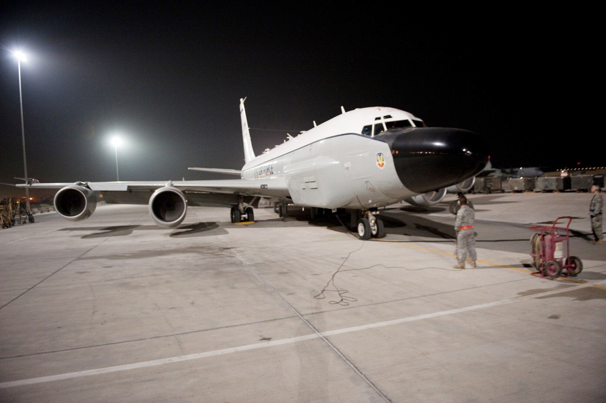 Airmen from the 55th Aircraft Maintenance Unit recover a RC-135V/W Rivet Joint Oct. 7, 2009, at an air base in Southwest Asia. RC-135V/Ws deployed to Southwest Asia met a 7,000 consecutive day milestone Oct. 7 in the U.S. Central Command area of responsibility. The squadron provides commanders near real-time on-scene intelligence collection, analysis and dissemination in support of operations Iraqi Freedom and Enduring Freedom. (U.S. Air Force photo/Staff Sgt. Robert Barney) 