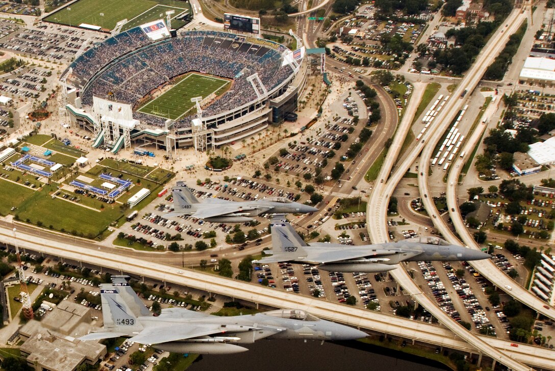 F-15 Eagles from the 125th Fighter Wing fly over the Jacksonville Municipal Stadium,  Jacksonville, Fl after performing a flyover for the Jacksonville Jaguars Football game against the Tennessee Titans, October 4, 2009. (Air  Force Photo by Tech. Sgt. Shelley Gill)