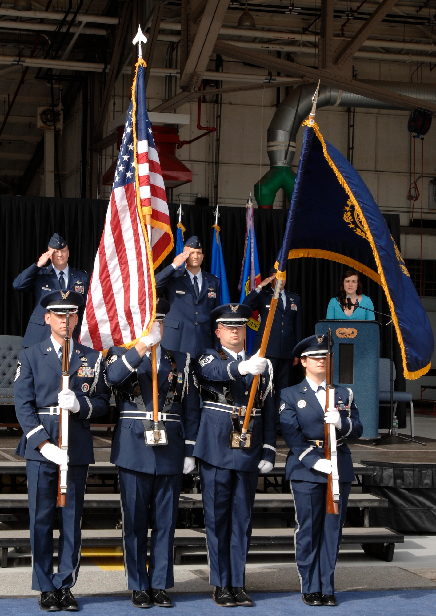 Pease Air National Guard Base, N.H., Honor Guard members begin the 64th Air Refueling Squadron activation and assumption of command ceremony, Oct. 2, 2009, with a salute during the singing of the national anthem.  (U.S. Air Force photo/Senior Airman Laura Suttles)