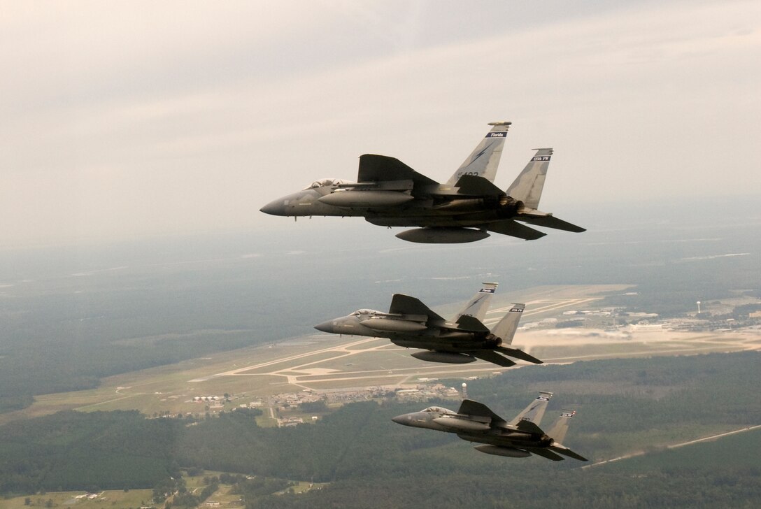 F-15 Eagles from the 125th Fighter Wing prepare to land after performing a flyover for the Jacksonville Jaguars Football game against the Tennessee Titans, Jacksonville, Fl, October 4, 2009. (Air  Force Photo by Tech. Sgt. Shelley Gill)