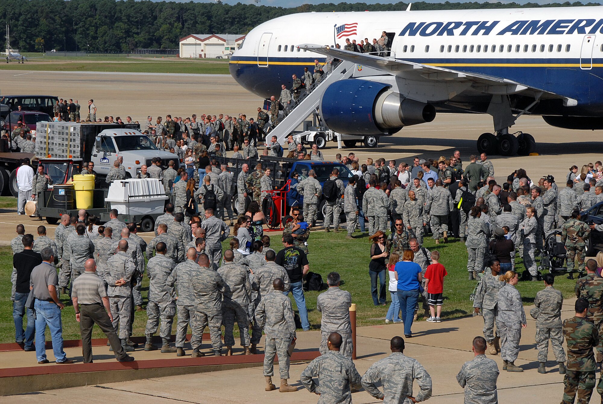 LANGLEY AIR FORCE BASE, Va. – Returning Airmen are met by a receiving line of commanders, chiefs and first sergeants here Oct. 1.  More than 150 Airmen returned from a 120-day deployment to Kadena Air Base, Japan. The goal of the deployment was to support the Pacific Theater Security Package and ensure stability in the region. (U.S. Air Force Photo/Master Sgt. Carlos J. Claudio) 