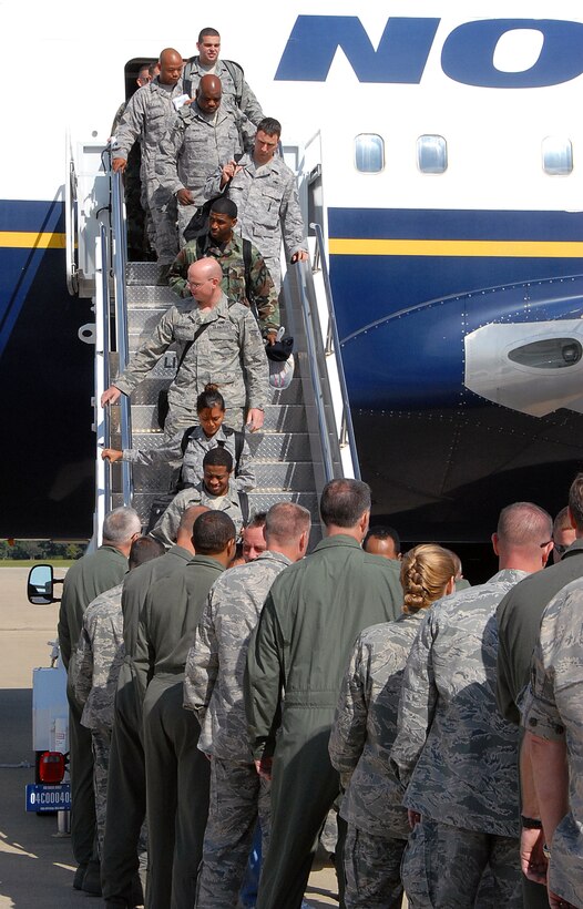 LANGLEY AIR FORCE BASE, Va. – Returning Airmen are met by a receiving line of commanders, chiefs and first sergeants here Oct. 1.  More than 150 Airmen returned from a 120-day deployment to Kadena Air Base, Japan. The goal of the deployment was to support the Pacific Theater Security Package and ensure stability in the region. (U.S. Air Force Photo/Master Sgt. Carlos J. Claudio) 