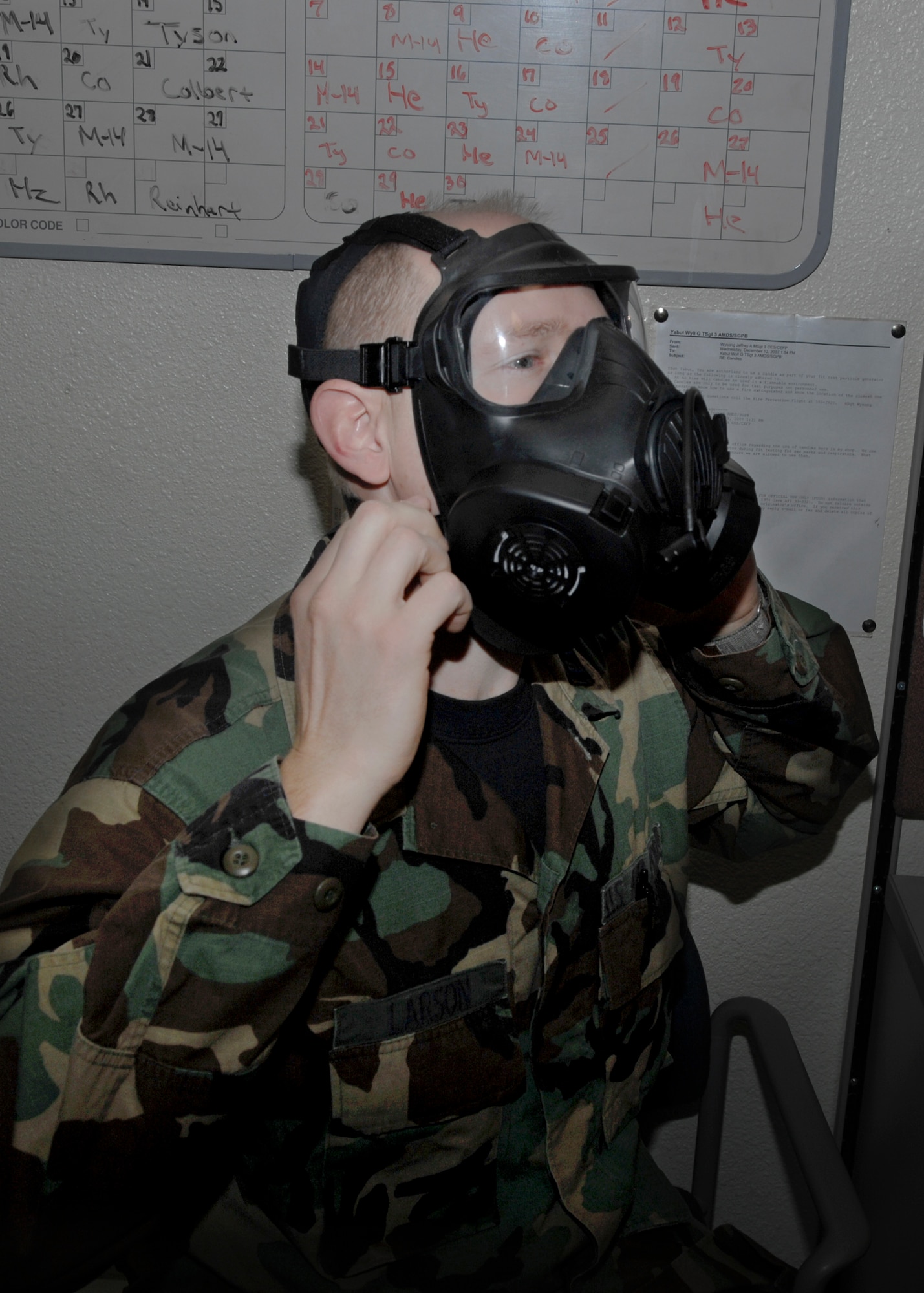 ELMENDORF AIR FORCE BASE, Alaska ? Capt. Brian Larson, 3rd Medical Group anesthesiologist removes the M-50 gas mask after a fit test. The M-50 will be replacing the MCU-2 gas masks in the Pacific Air Forces. (U.S. Air Force photo/Airman Jack Sanders) 