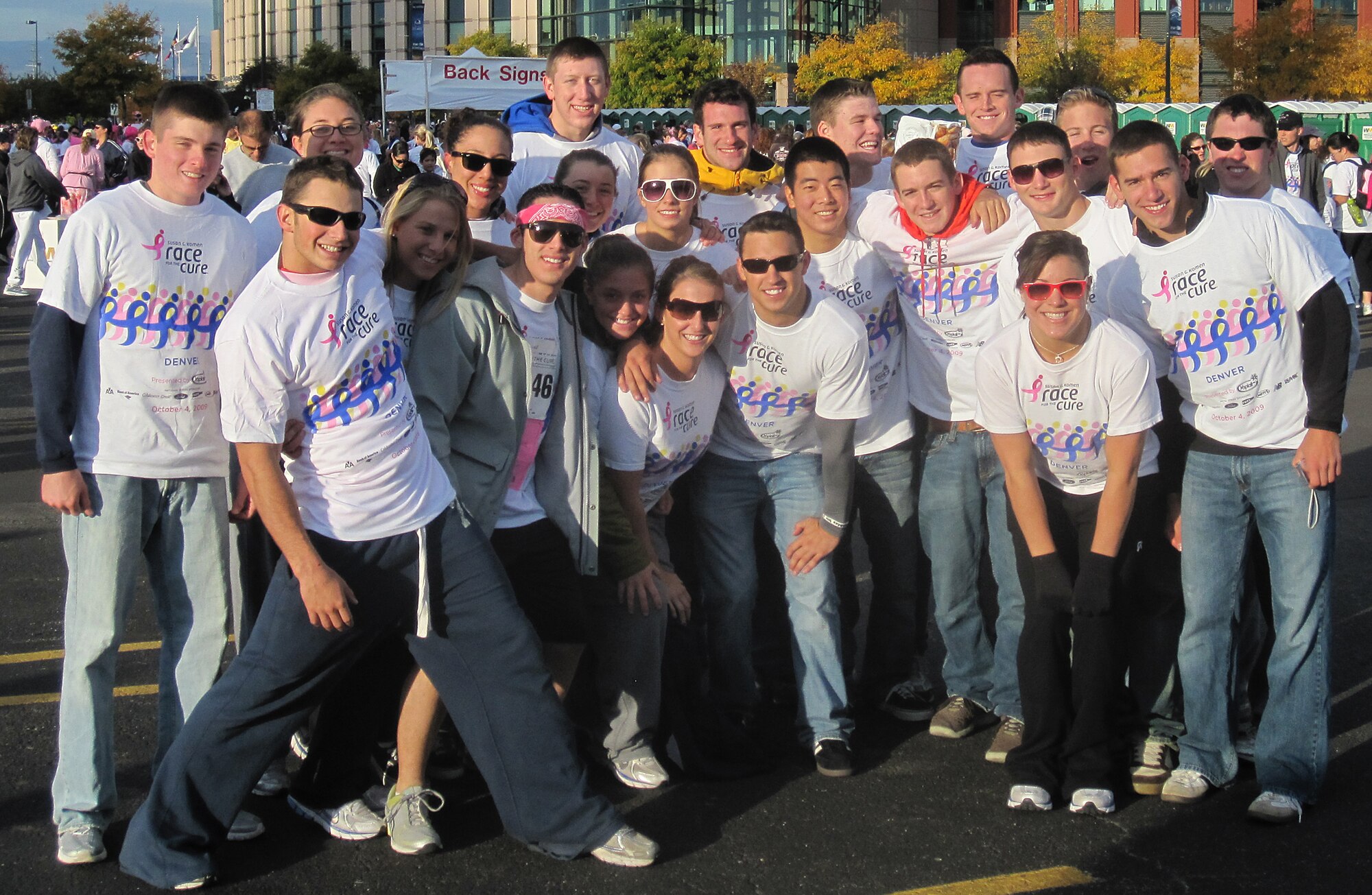 Members of the Air Force Academy men's and women's gymnastics teams pose for a group photo at the Susan G. Komen Race for the Cure in Denver Oct. 4. The teams raised more than $2,000 for breast cancer research. (U.S. Air Force photo courtesy of Athletic Communications)