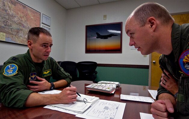 CREATING CANDOR - In a flight debrief, everyone makes constructive comments -- positive and negative -- regardless of their position or rank. (photo by Tech. Sgt. Matthew Hannen)