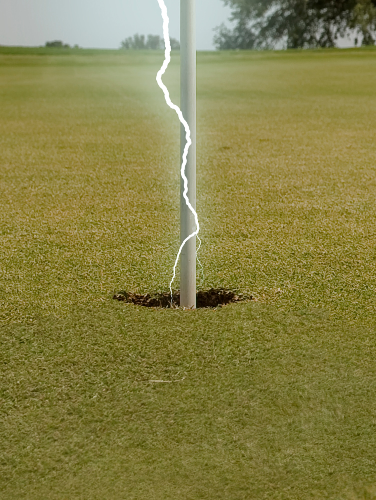 LIGHTNING BOLT KILLS GOLFER
? Before heading to the golf course, check weather reports, and curb your outdoor activities accordingly.
? At the golf course heed all weather warnings.
? If you see lightning off in the distance, head to the clubhouse or other indoor shelter immediately. Don't wait!
? If you cannot get to an enclosed building, go to a low-lying, open place away from trees, poles or metal objects. Ensure the place you pick is not subject to flooding. Distance yourself from anything metal or graphite. Remember, lightning rods are often made of graphite. It's a good idea to place your cart at least 50 feet away from you.
(photo by Tech. Sgt. Matthew Hannen)