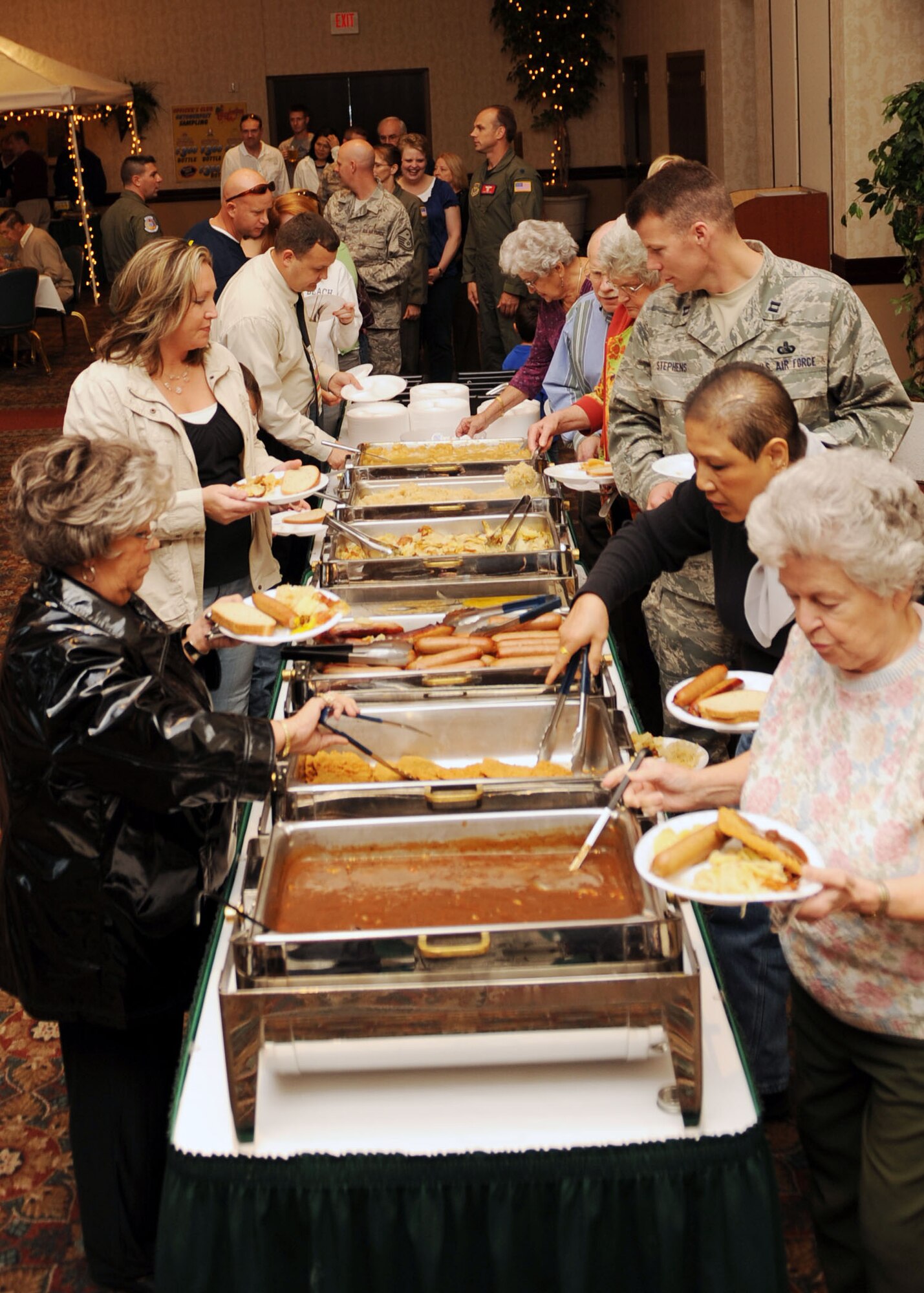 SCOTT AIR FORCE BASE Ill. – Members of Team Scott wait in line to enter this year’s Oktoberfest party held at the Scott Club, Sept. 7. This yearly event featured a $100 prize toward the cost of a holiday party for the squadron with the most attendance throughout the night. (U.S. Air Force photo by Airman 1st Class Wesley Farnsworth)