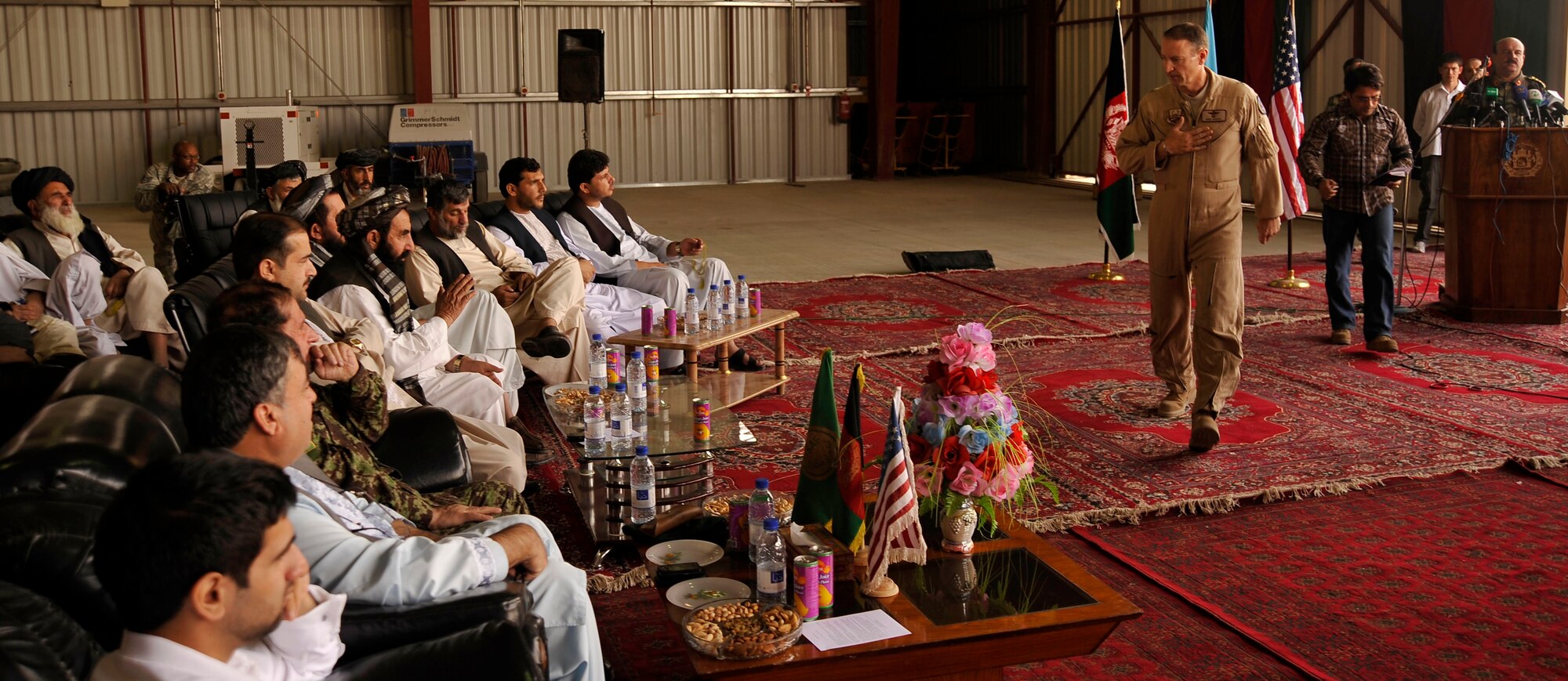 U.S. Air Force Brig. Gen. Mike Boera helps addresses the audience at an Afghan National Army Air Corp wing activation Oct. 5, 2009 at Kandahar Air Field. The wing is the ANAAC's second and supports Mi-17 helicopter operations and training. General Boera is the Commanding General of Combined Air Power Transition Force, Combined Security Transition Command-Afghanistan. (U.S. Air Force photo/Staff Sgt. Angelita Lawrence)