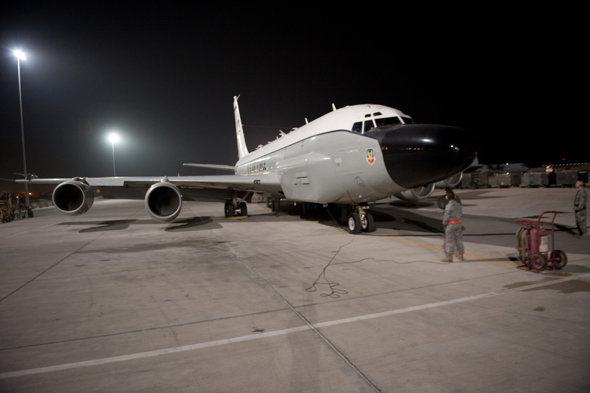 Airmen from the 55th Aircraft Maintenance Unit recover a RC-135V/W Rivet Joint, Oct. 7, in Southwest Asia. The RC-135V/W Rivet Joints deployed to Southwest Asia met a 7,000 consecutive day milestone Oct. 7 in the U.S. Central Command area of responsibility. The squadron provides commanders near real-time on-scene intelligence collection, analysis and dissemination in support of Operations Iraqi and Enduring Freedom. (U.S. Air Force photo/Staff Sgt. Robert Barney) 