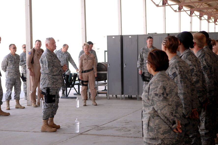 Gen. Arthur J. Lichte, commander of Air Mobility Command at Scott Air Force Base, Ill., talks with Airmen of the 777th Expeditionary Airlift Squadron at Joint Base Balad on Oct. 6, 2009. General Lichte visited JBB as part of a tour throughout Southwest Asia to observe air mobility capabilities and missions. (U.S. Air Force Photo/Senior Airman Christopher Hubenthal) 