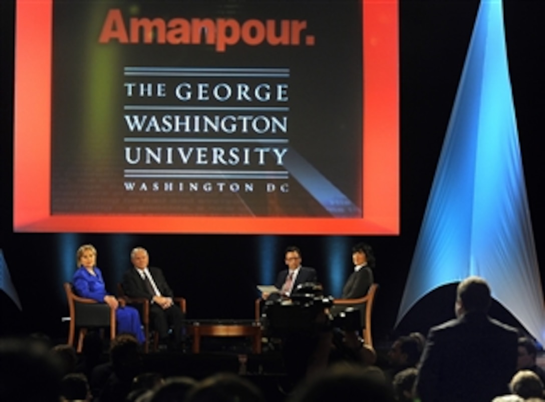 Secretary of State Hillary Rodham Clinton (left), Secretary of Defense Robert M. Gates, Director Frank Sesno (2nd from right) and CNN Chief International Correspondent Christiane Amanpour (right) listen to a question from a student at the George Washington University School of Media and Public Affairs in Washington on Oct. 5, 2009.  