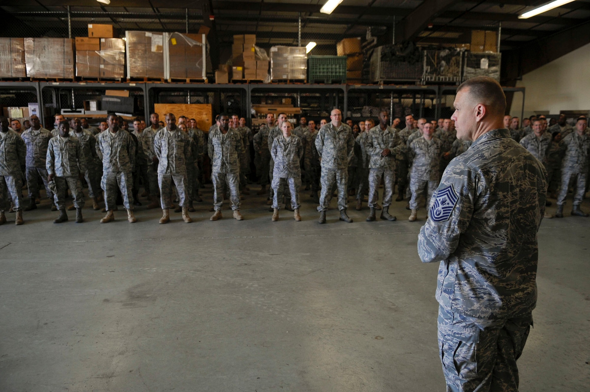 Chief Master Sgt. of the Air Force James A. Roy speaks with members of the 316th Civil Engineer Squadron Oct. 7, 2009, at Joint Base Andrews Naval Air Facility Washington. Chief Roy used his background as a heavy equipment operator to relate to the squadron and help give them insight into the recent increase in CE deployments and special taskings. Chief Roy also stressed the importance of spouses and family members and their role in keeping a healthy and effective Air Force. (U.S. Air Force photo/Senior Airman Steven R. Doty) 