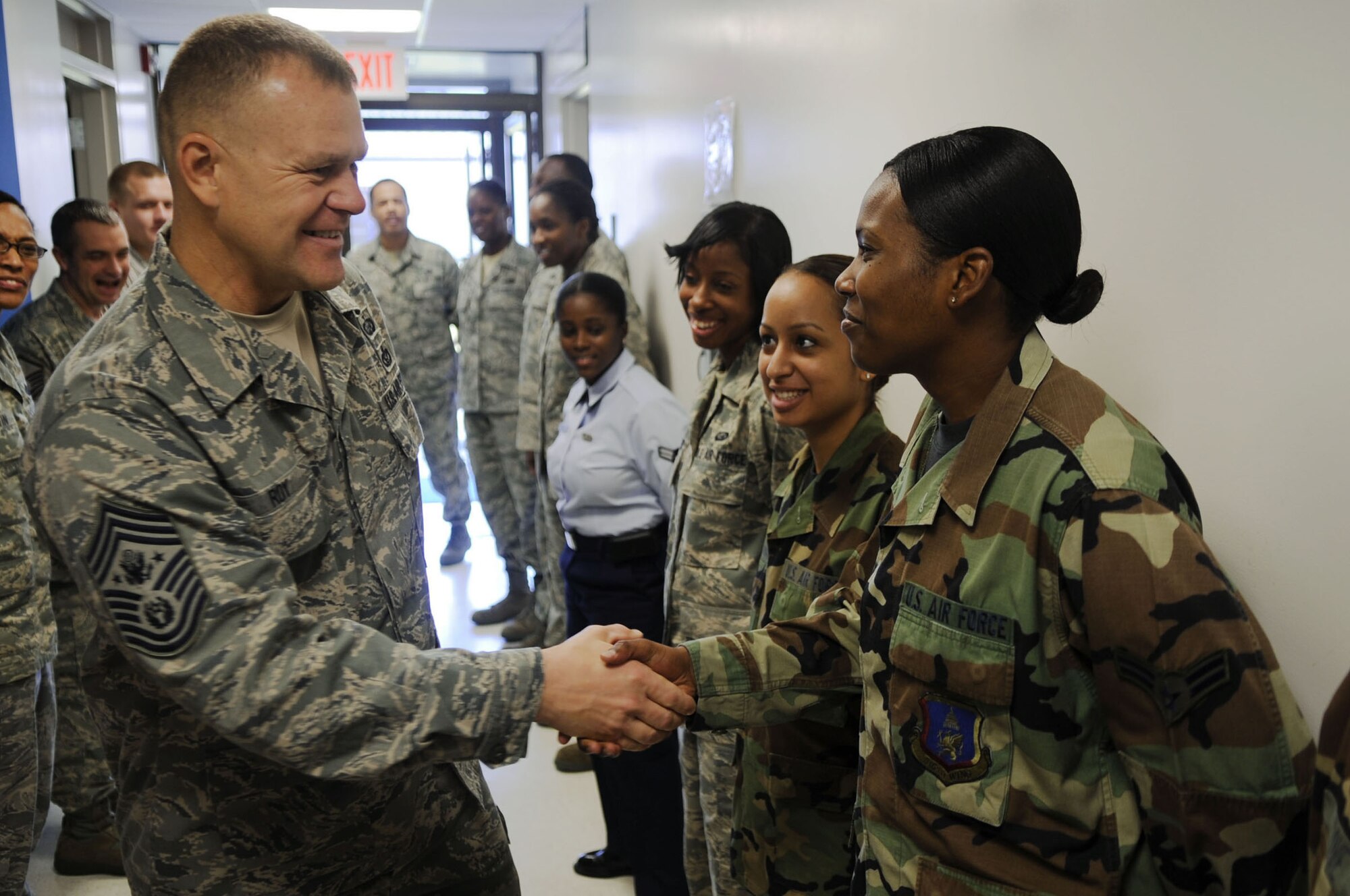 Chief Master Sgt. of the Air Force James A. Roy meets Airman 1st Class Ashley Adams during a visit Oct. 7, 2009, to Joint Base Andrews Naval Air Facility Washington. Chief Roy met with Airmen to thank them for their support. Airman Adams is a 316th Force Support Squadron career development technician. (U.S. Air Force photo/Senior Airman Steven R. Doty) 