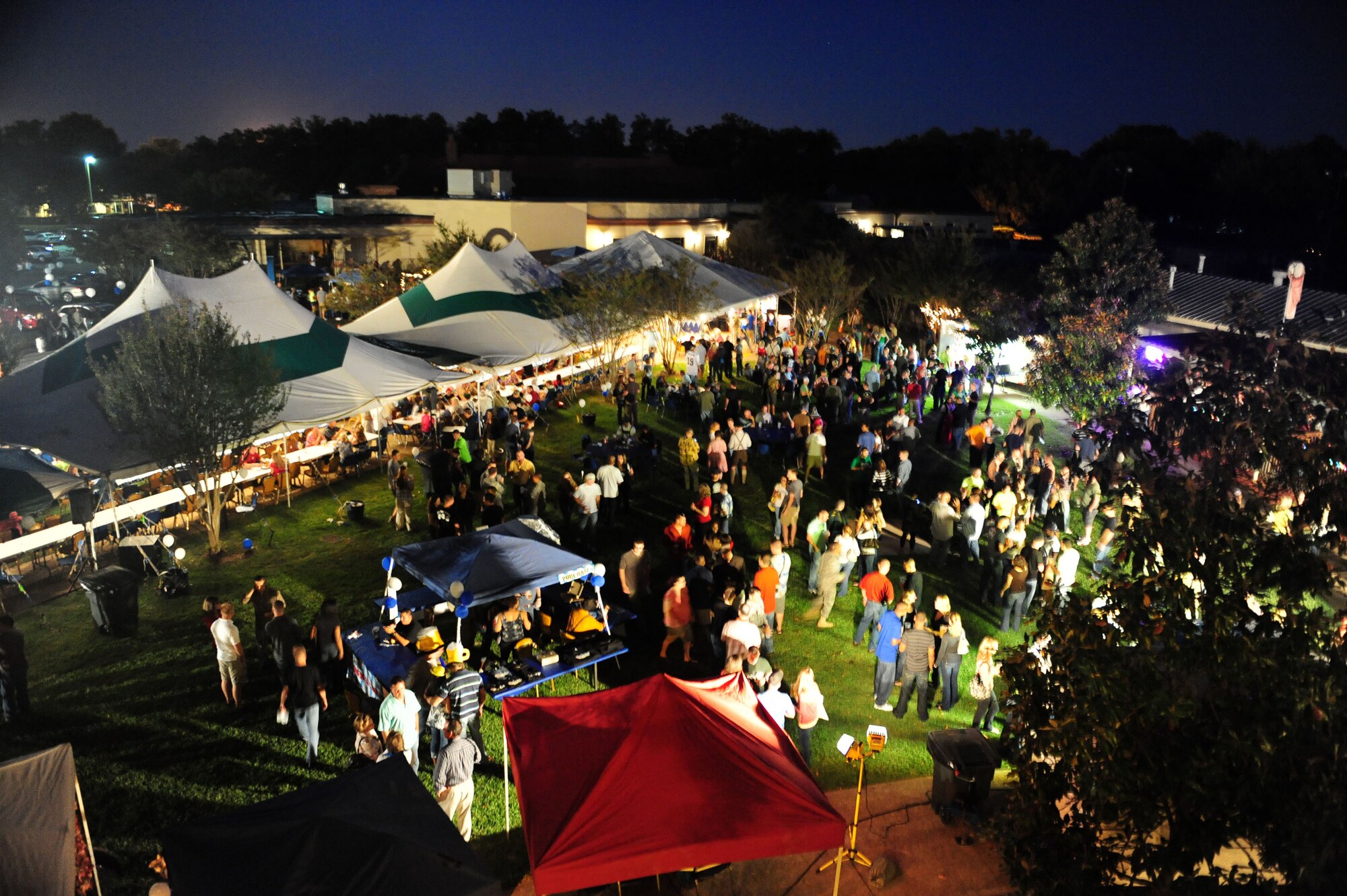 Revelers enjoy the second annual Barksdale Oktoberfest celebration Oct. 2. More than 1,000 guests enjoyed a night of fellowship, music, food and prizes at the Barksdale Club. (U.S. Air Force photo by Staff Sgt. Mike Andriacco)