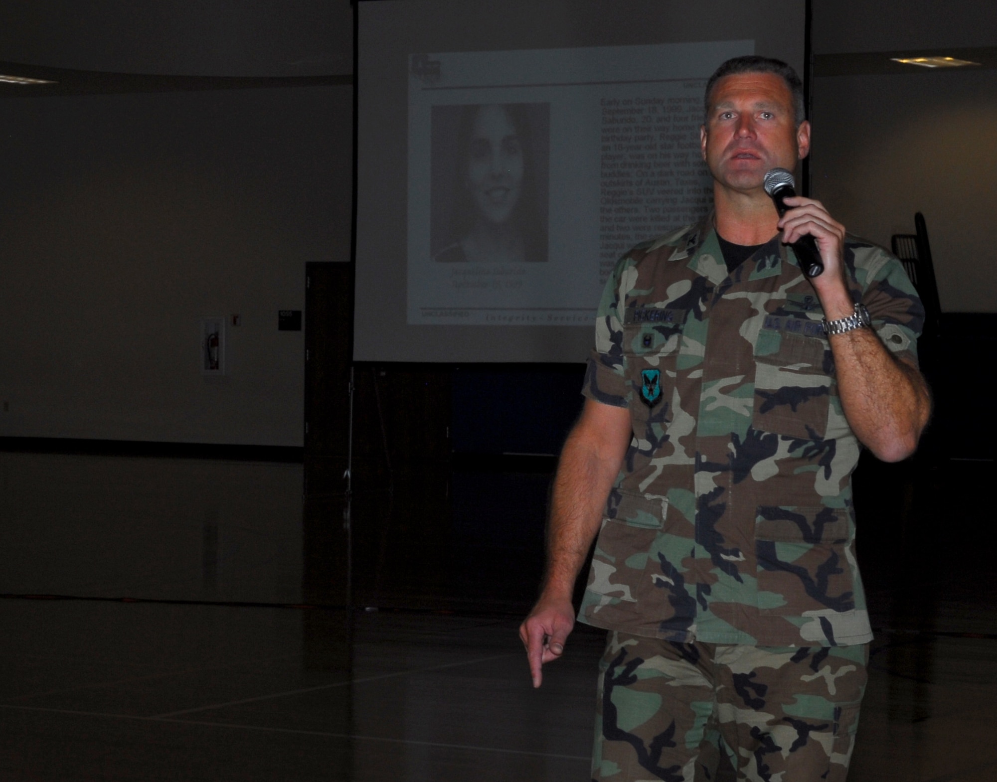 Buckley Air Force Base, Colo.—Col. Trent Pickering, 460th Space Wing vice commander, provides closing remarks to Team Buckley during a Commander's Call to kick off the Fall Safety Campaign Oct. 8. The base safety office put together the Wingman Day Fair to help build strong Wingmen and a safer Team Buckley. There were several booths set up to assist with health awareness, home and driving safety. (U.S. Air Force photo by Staff Sgt. Anika K. Williams)