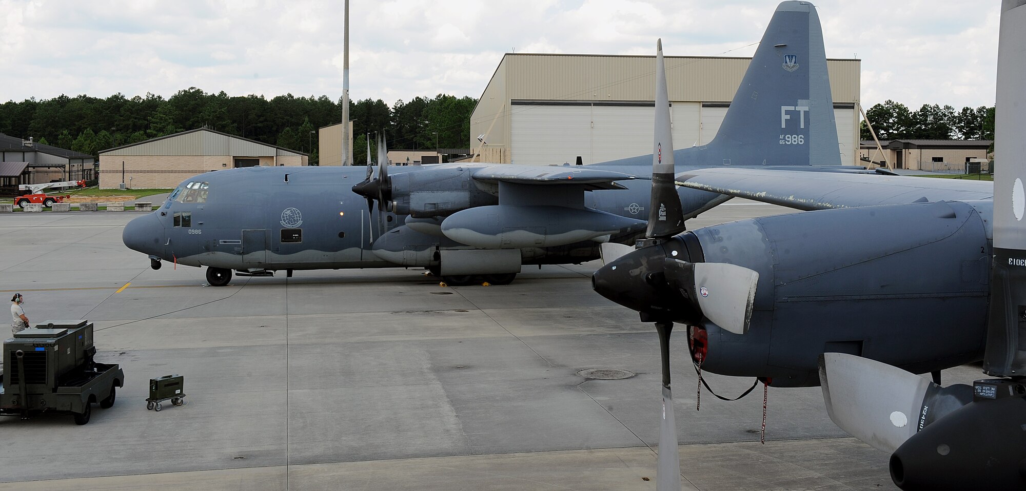 MOODY AIR FORCE BASE, Ga. -- Airman 1st Class Carissa Lorenz, 723rd Aircraft Maintenance Squadron crew chief, performs standing ground for an HC-130P/N Combat King due to an airbort caused by technical difficulties here. The aircraft had to make a return landing due to a computer malfunction. (U.S. Air Force photo by Airman 1st Class Joshua Green)