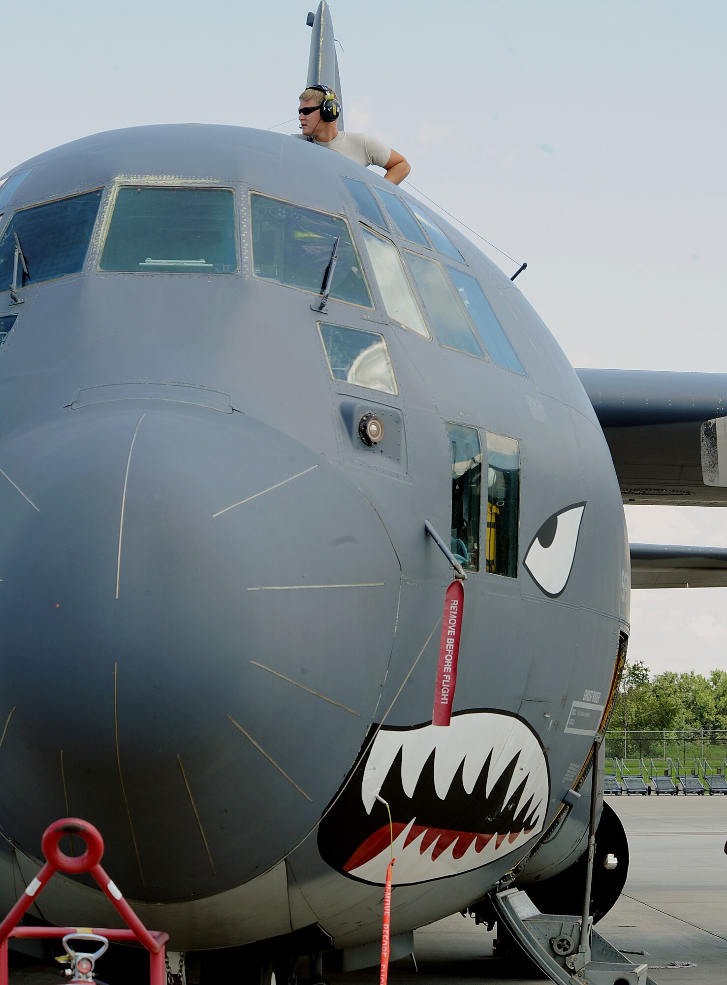 MOODY AIR FORCE BASE, Ga. -- Senior Airman Jason Steinbach, 723rd Aircraft Maintenance Squadron crew chief, checks a dry panel on top of a HC-130P/N Combat King as he performs a routine check here. (U.S. Air Force photo by Airman 1st Class Joshua Green)