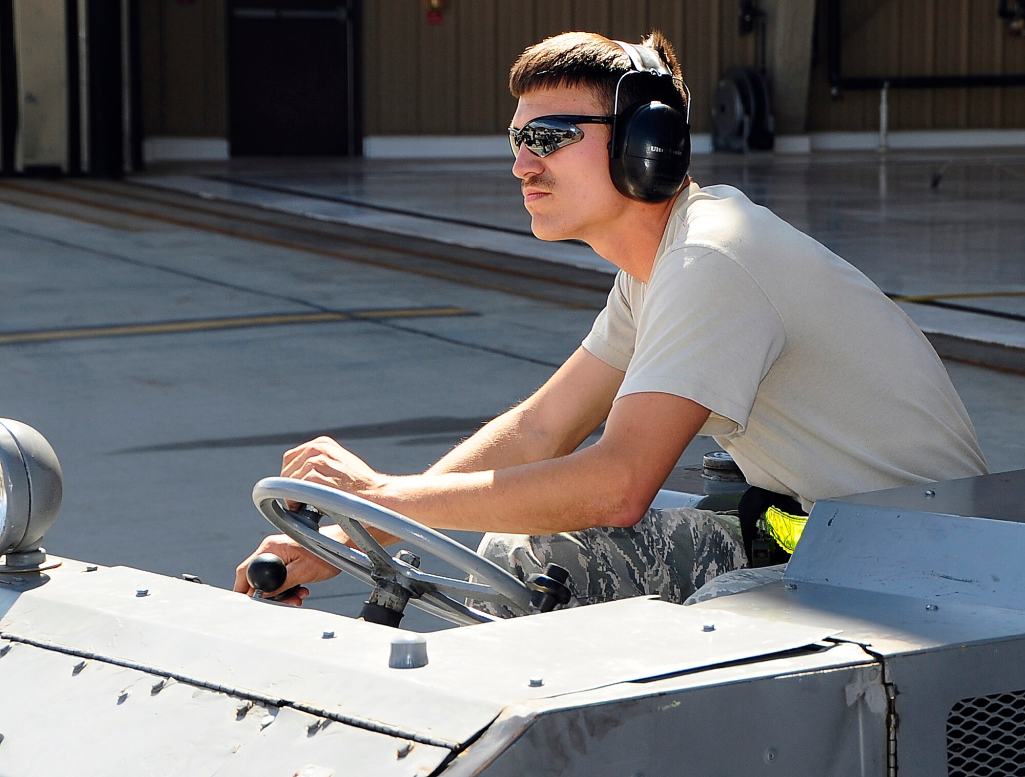 HOLLOMAN AIR FORCE BASE, N.M. -- Senior Airman Steven Johnson prepares to load an F-22A Raptor during a Phase 1 exercise here Oct. 7. Airman Johnson works for the 49th Aircraft Maintenance Squadron as a 7th Weapons 1 Man Loadcrew Member. (U.S. Air Force photo by Tech. Sgt. Chris Flahive)