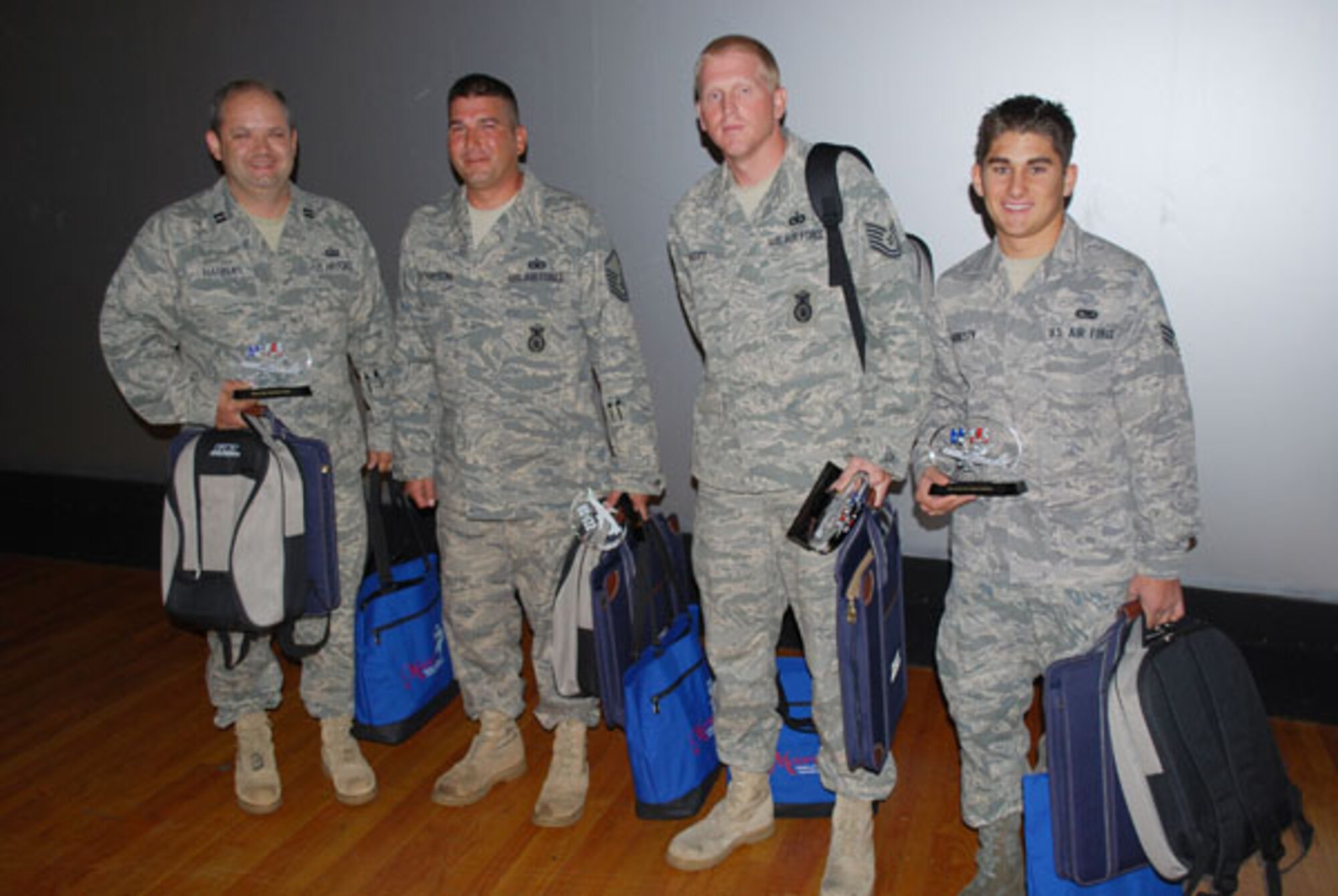 The top Airmen of the Quarter awards were announced recently for the 507th Air Refueling Wing.  The winners, pictured left to right, are Capt. Bruce Hanna, 507th ARW Operations Group as Company Grade Officer of the Quarter; MSgt Jeffery Thompson from the 507 ARW Mission Support Group as Senior NCO of the Quarter; TSgt Christopher Scott from the 507th ARW Mission Support Group as NCO of the Quarter; and SRA Trevor Hardesty from the 507th ARW Maintenance Group as Airman of the Quarter.  The Moore Chamber of Commerce has been a sponsor for the Air Force Reserve for several years helping recognize the top reservists for their accomplishments. 