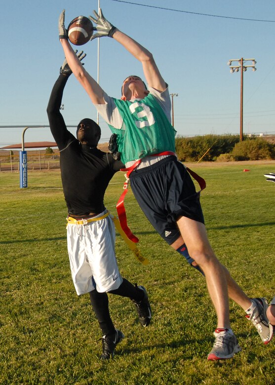 The 95th Medical Group pulled off a two-point win over the 412th Electronic Warfare Group 14-12 in intramural football at Wings Field here Oct. 6. (Air Force photo/Airman 1st Class William A. O'Brien)