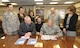 The Combined Federal Campaign kicked off Oct. 7 and will run through Nov. 13. From left: Col. Paul Waugh, Oklahoma City Air Logistics Center vice commander; Mindy Banz, CFC director; John Over, OC-ALC executive director; Melba Smith, CFC loaned executive; Tim Eldridge, CFC loaned executive; Maj. Gen. David Gillett, OC-ALC commander; Capt. Sam Sebaihi, CFC loaned executive and Laura Culberson, OC-ALC chief of staff; look over the CFC charity list as the ALC leaders prepare to fill out pledge forms. (Air Force photo by Margo Wright)