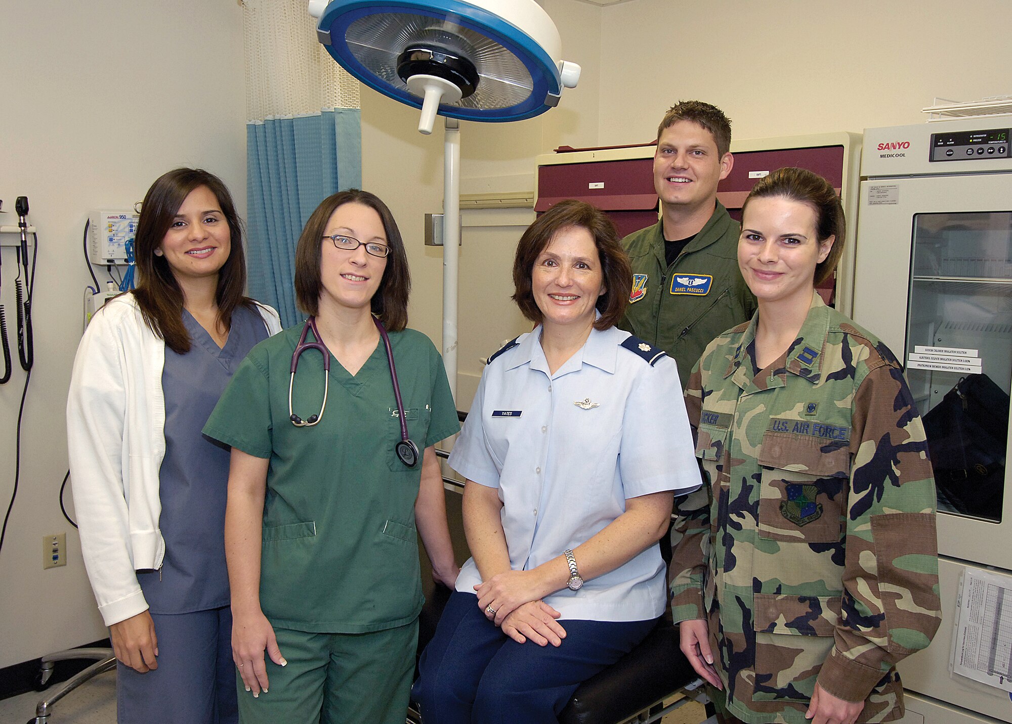 Lt. Col. Monique Yates credits an unknown Airman and a medical team of the 72nd Aerospace Medical Squadron for her survival from a life-threatening allergic reaction.  Members of that team join Colonel Yates recently as she returned with thanks for their help.  From left are; Angelica Lopez, LPN; Amanda Jordan, LPN; Capt. (Dr.) Daniel Pascucci; and  Capt. Nikki Tucker, RN. (Air Force photo by Margo Wright)