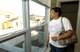 Felicea Winrow takes her first look out a bedroom window of her new home on Blackbird Drive Oct. 1, a newly-opened Tinker housing area by the Scissortail Trail.  “I’m so excited!” she said as she looked through each room.  The Winrow family was one of several who got the keys to their new homes on Blackbird that day. As progress continues, more families will transition into new homes. (Air Force photo by Margo Wright)
