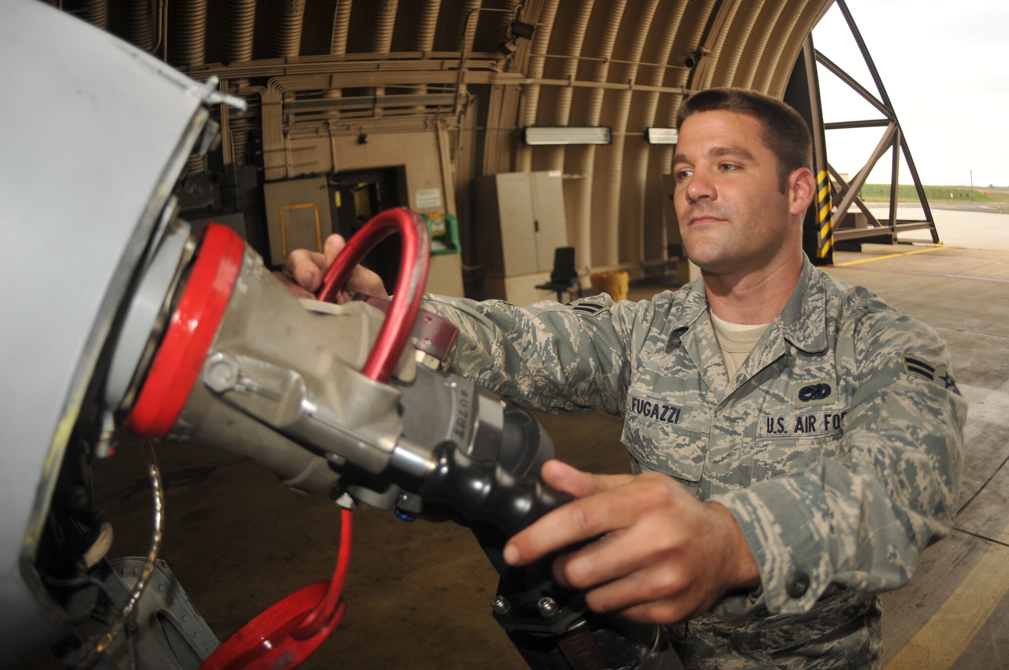 SPANGDAHLEM AIR BASE, Germany -- Airman 1st Class Dominick Fugazzi, 52nd Aircraft Maintenance Squadron, loads fuel on an A-10 Thunderbolt II on the flightline Oct. 3. Air Force crew chiefs ensure that aircraft are fully loaded with fuel before take off as part of the pre-flight inspection. (U .S. Air Force photo/Airman 1st Class Nick Wilson)