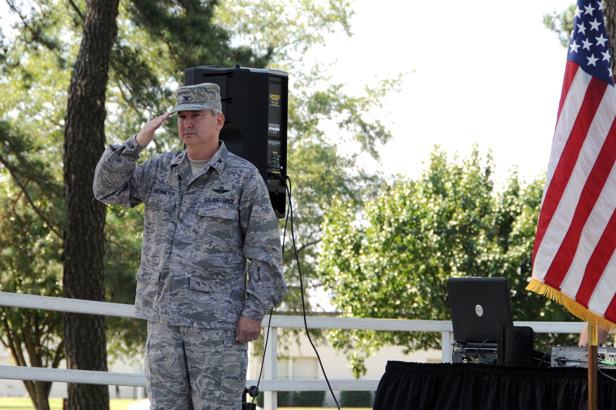 Col. Fritz Linsenmeyer, commander, 916th Air Refueling Wing, opens up the Family Day Picnic Oct. 3, with the playing of the National Anthem.  (U.S. Air Force photo by Tech. Sgt. Gillian M. Albro, 916th ARW/PA)