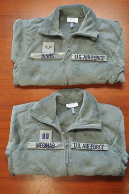 Pictured are sage green fleece outer garments with proper placement of name
and rank tapes.  The 98th Air Force Virtual Uniform Board released a policy message for wearing the new Air Force sage green fleece as an outer garment for the Airmen Battle Uniform.
