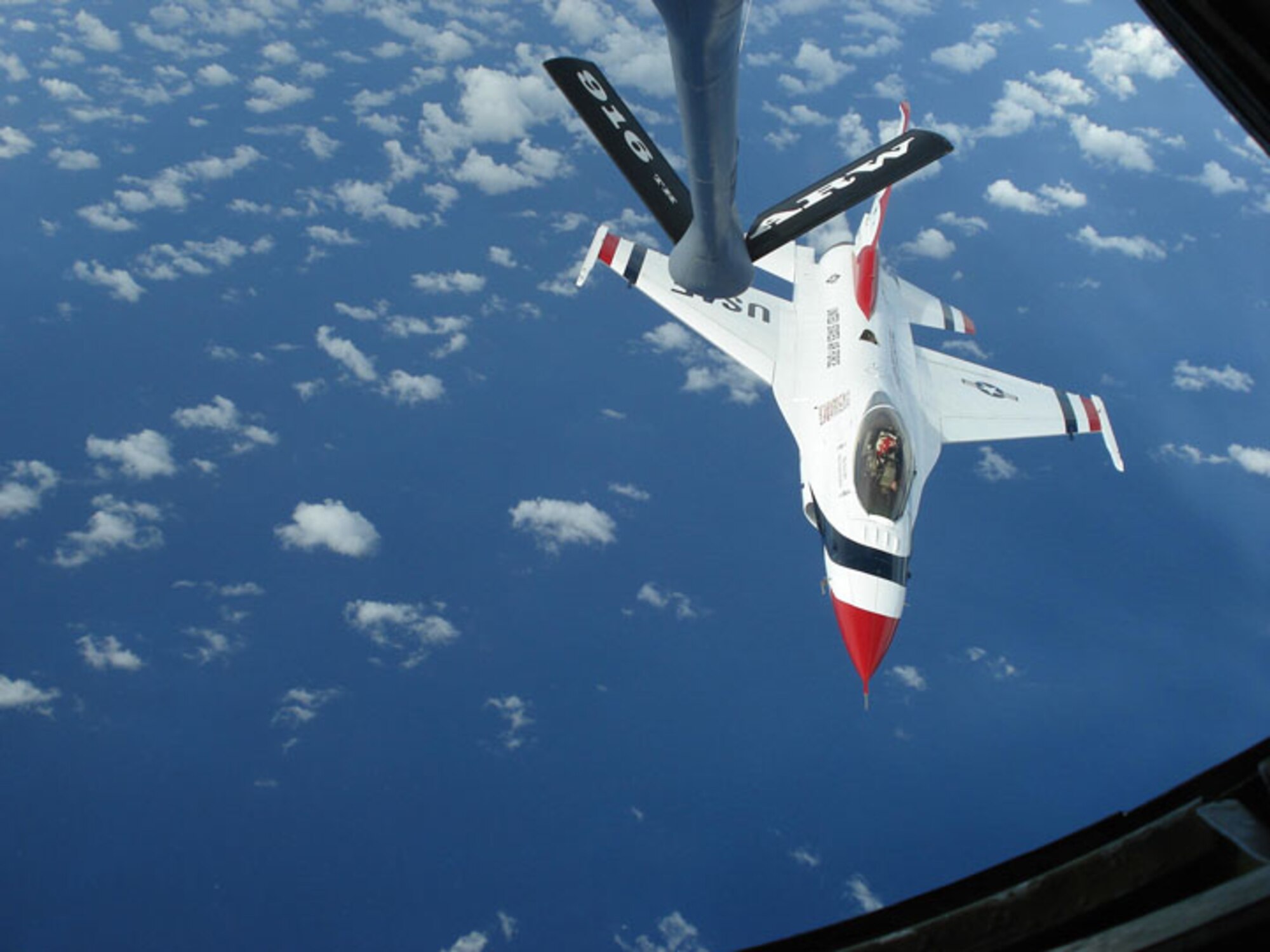 SEYMOUR JOHNSON AIR FORCE BASE, N.C. -- A U.S. Air Force Thunderbird breaks off after receiving fuel from a 916th Air Refueling Wing KC-135R Stratotanker over Saipan.                   