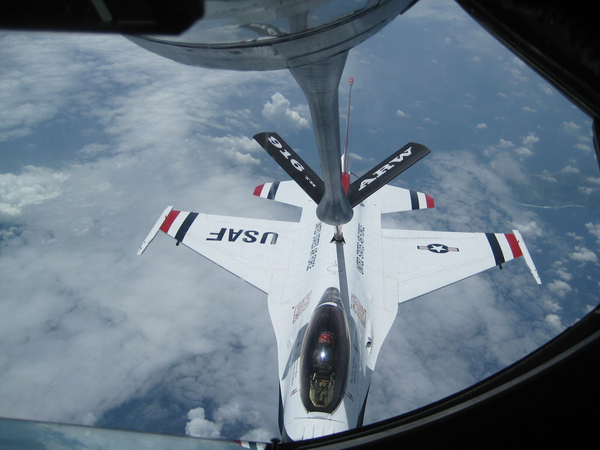 SEYMOUR JOHNSON AIR FORCE BASE, N.C. -- A KC-135R from the 916th Air Refueling Wing refuels a U.S. Air Force Thunderbird over Saipan.