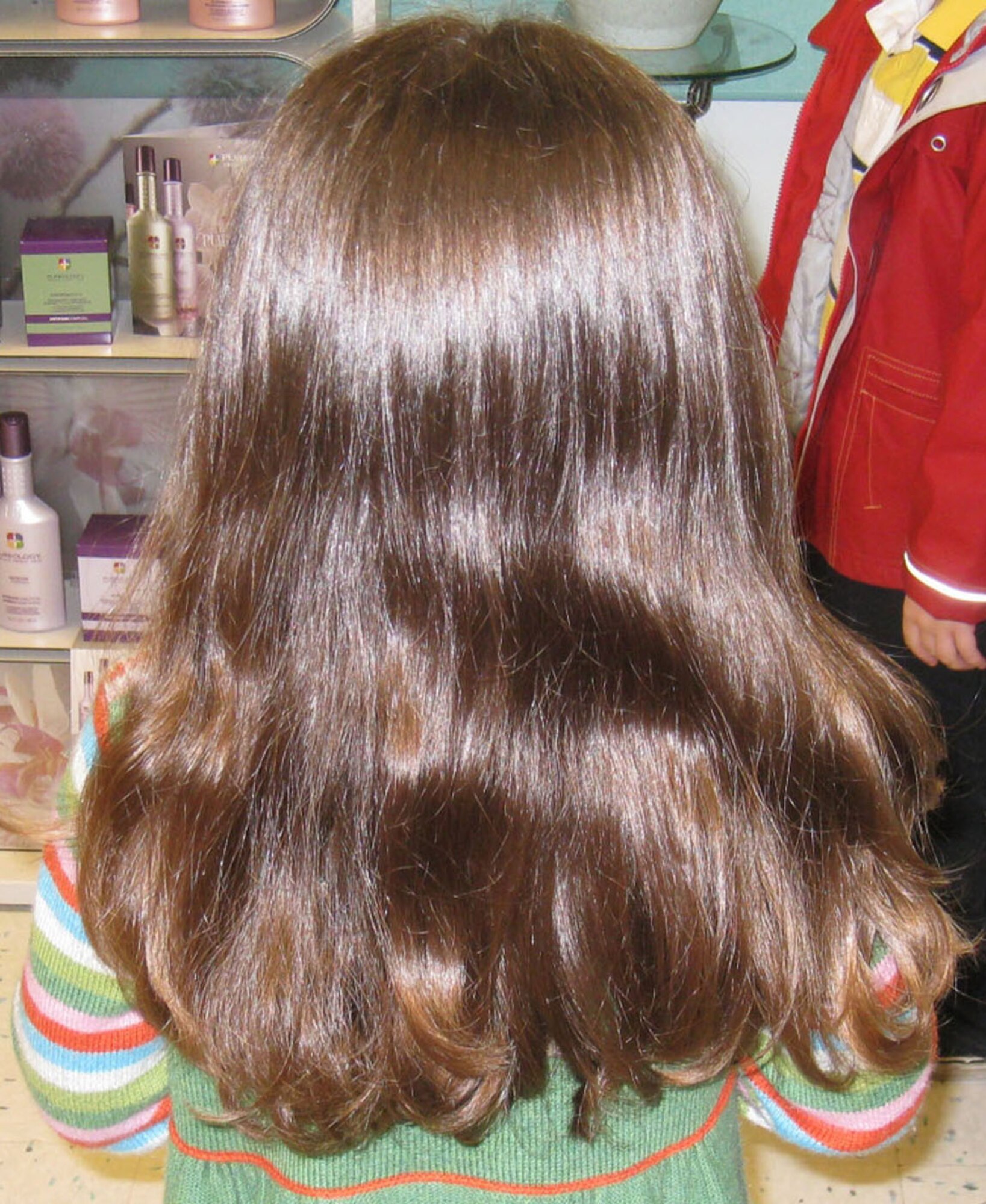 Long and luxurious - this is how 4-year-old Noel Ingram's hair used to look, before she had it cut short. She donated the cut hair to "Locks of Love" - a non-profit organization providing hairpieces to financially disadvantaged children, in the United States and Canada, who suffer from long-term medical hair loss from any diagnosis. (Courtesy photo by Sarah Kite)