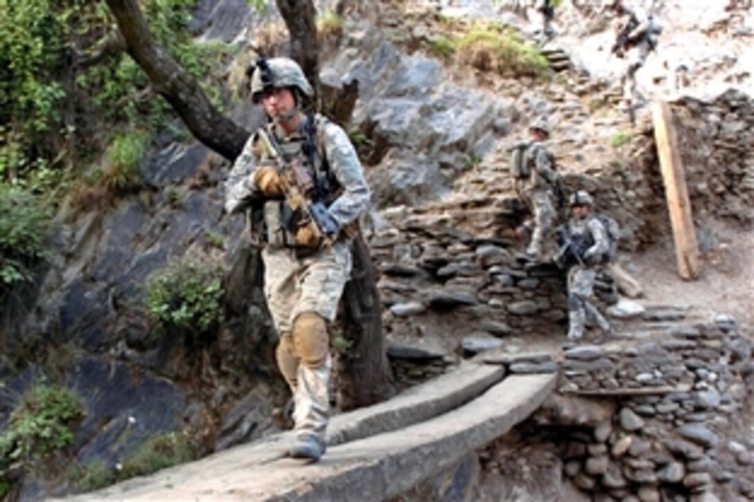 U.S. Air Force Airman 1st Class James Craddick crosses a fast-flowing river while on patrol in 
Korengal Valley, Kunar province, Afghanistan, Oct. 1, 2009. Craddick is assigned to 4th Infantry Division's Company B, 2nd Battalion, 12th Infantry Regiment.