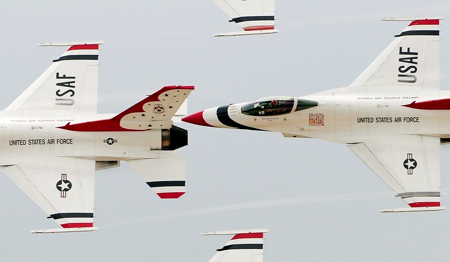 ANDERSEN AIR FORECE BASE, Guam - The Air Force Thunderbirds perform a maneuver for the audience attending the Team Andersen Air Show '09 "Air Power over the Marianas" here on Andersen Air Force Base, Guam, Oct. 7. The U.S. Air Force's aerial demonstration team, the Thunderbirds, were one of four aerial demonstration teams to perform for the audience. (U.S. Air Force photo by Airman 1st Class Courtney Witt)