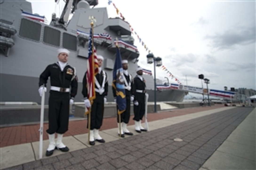 A U.S. Navy honor guard presents the colors at the commissioning ceremony for the U.S. Navy's newest Arleigh Burke-class guided missile destroyer, Wayne E. Meyer at Penn's Landing in Philadelphia, Oct. 10, 2009. Meyer, who passed away in September, was known as the "Father of Aegis" for helping develop the weapons systems that are the centerpiece of the Navy's cruiser and destroyer fleet.