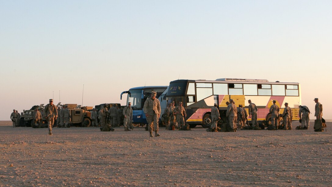 Marines from Combat Logistics Battalion 22, 22nd Marine Expeditionary Unit, unload buses at a bivouac site for Exercise Bright Star 2009 in Egypt Oct. 10, 2009. The multinational exercise is designed to improve readiness, interoperability, and strengthen the military and professional relationships among U.S., Egyptian and participating forces. Bright Star is conducted by U.S. Central Command and held every two years. Elements of the 22nd MEU are currently are participating in the multi-national exercise while serving as the theater reserve force for U.S. Central Command.::r::::n::(Official Marine Corps photo by Cpl. Theodore W. Ritchie)::r::::n::