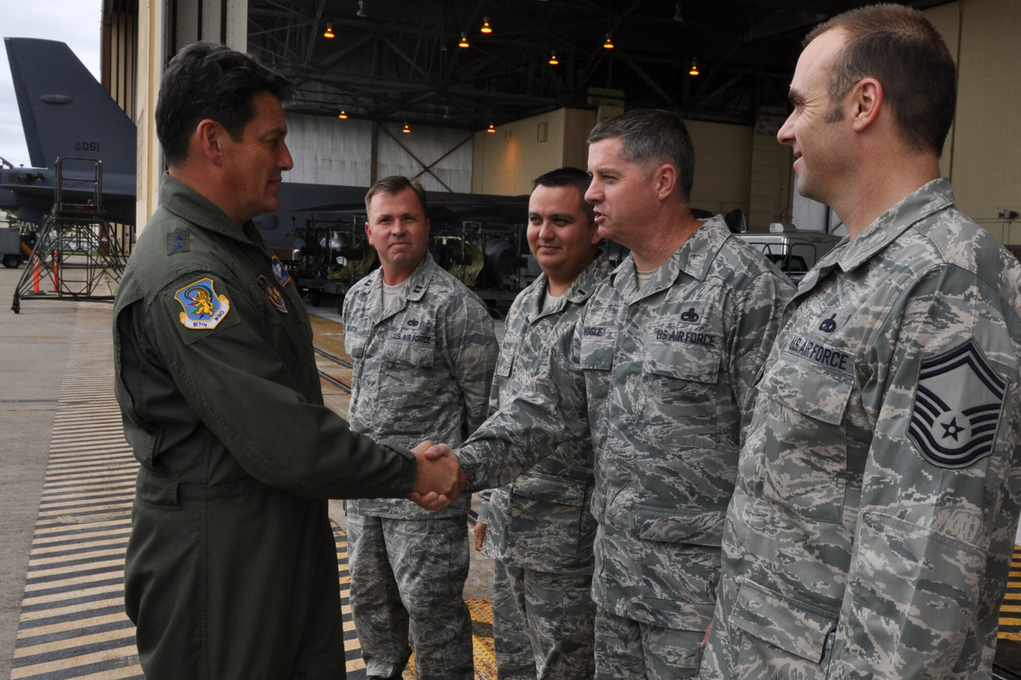 Maj. General Frank Padilla, 10th Air Force, commander, meets, Chief Master Sgt. Steve Vogle, 917th Aircraft Maintenance Squadron, superintendent, at Hangar One during a tour of 917th Wing facilities at Barksdale Air Force Base, La., October 7, 2009. Recently appointed, the 10th Air Force Commander is taking the opportunity to visit the 917th Wing and other commands under the 10 AF umbrella to get to know the Airmen and have a better understanding of the individual missions of the units under his command. (U.S. Air Force photo/Tech. Sgt. Jeff Walston)