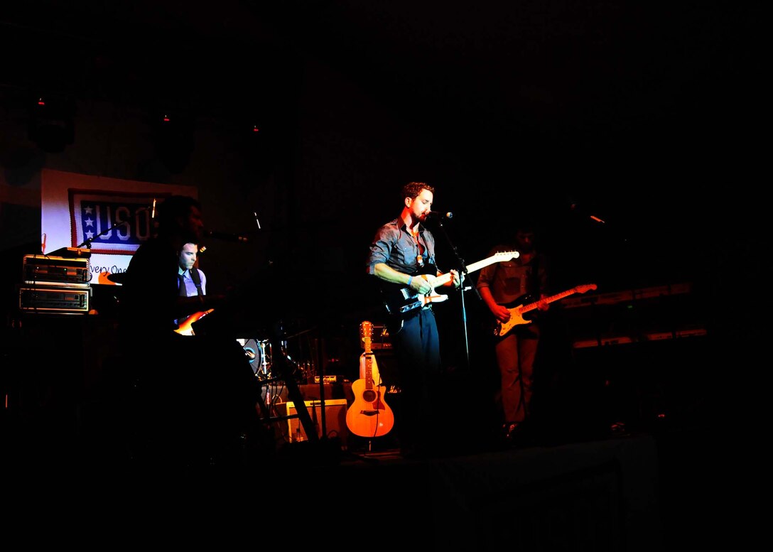 ANDERSEN AIR FORCE BASE, Guam - Clarias takes the stage and rocks the crowd while opening up for American Idol Season Five finialist Elliot Yamin at Tarague beache's Bamboo Willie's Oct. 9. The concert attended by hundreds of Andersen Air Force Base Airman and thier families was sponsered by The Armed Forces Entertainment and the United Servicemen's Organization. (U.S. Air Force photo by Senior Airman Nichelle Anderson)