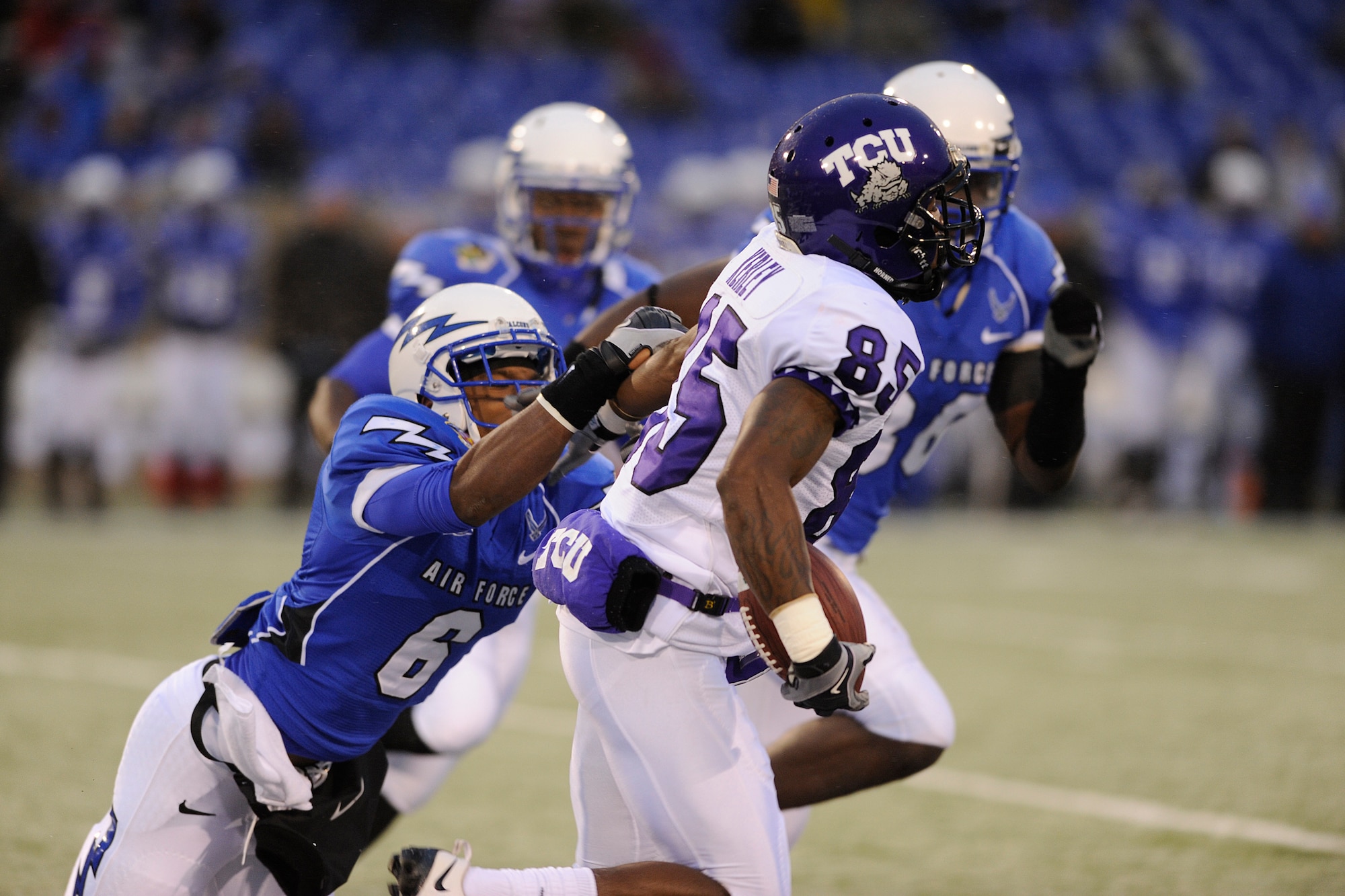 Falcons sophomore defensive back Jon Davis makes a diving tackle against the Horned Frogs' Jeremy Kerley during the Air Force-TCU game at Falcon Stadium Oct. 10, 2009. Davis, a Cincinatti native, had 10 tackles in Air Force's 20-17 loss to the 10th-ranked Horned Frogs. (U.S. Air Force photo/Mike Kaplan)