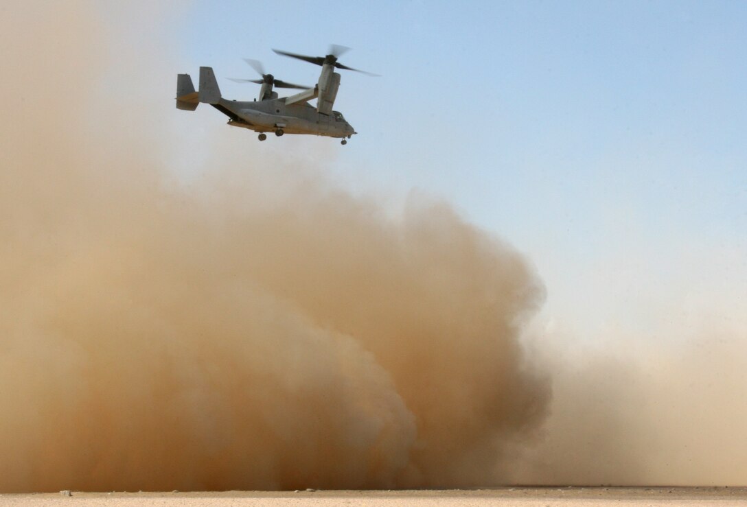 An MV-22B Osprey from Marine Medium Tiltrotor Squadron 263 (Reinforced), 22nd Marine Expeditionary Unit, kicks up a plume of sand as it takes off from a bivouac site during Exercise Bright Star 2009 in Egypt Oct. 11, 2009. The multinational exercise is designed to improve readiness, interoperability, and strengthen the military and professional relationships among U.S., Egyptian and participating forces. Bright Star is conducted by U.S. Central Command and held every two years. Elements of the 22nd MEU are currently are participating in the multi-national exercise while serving as the theater reserve force for U.S. Central Command.::r::::n::(Official Marine Corps photo by Cpl. Theodore W. Ritchie)::r::::n::