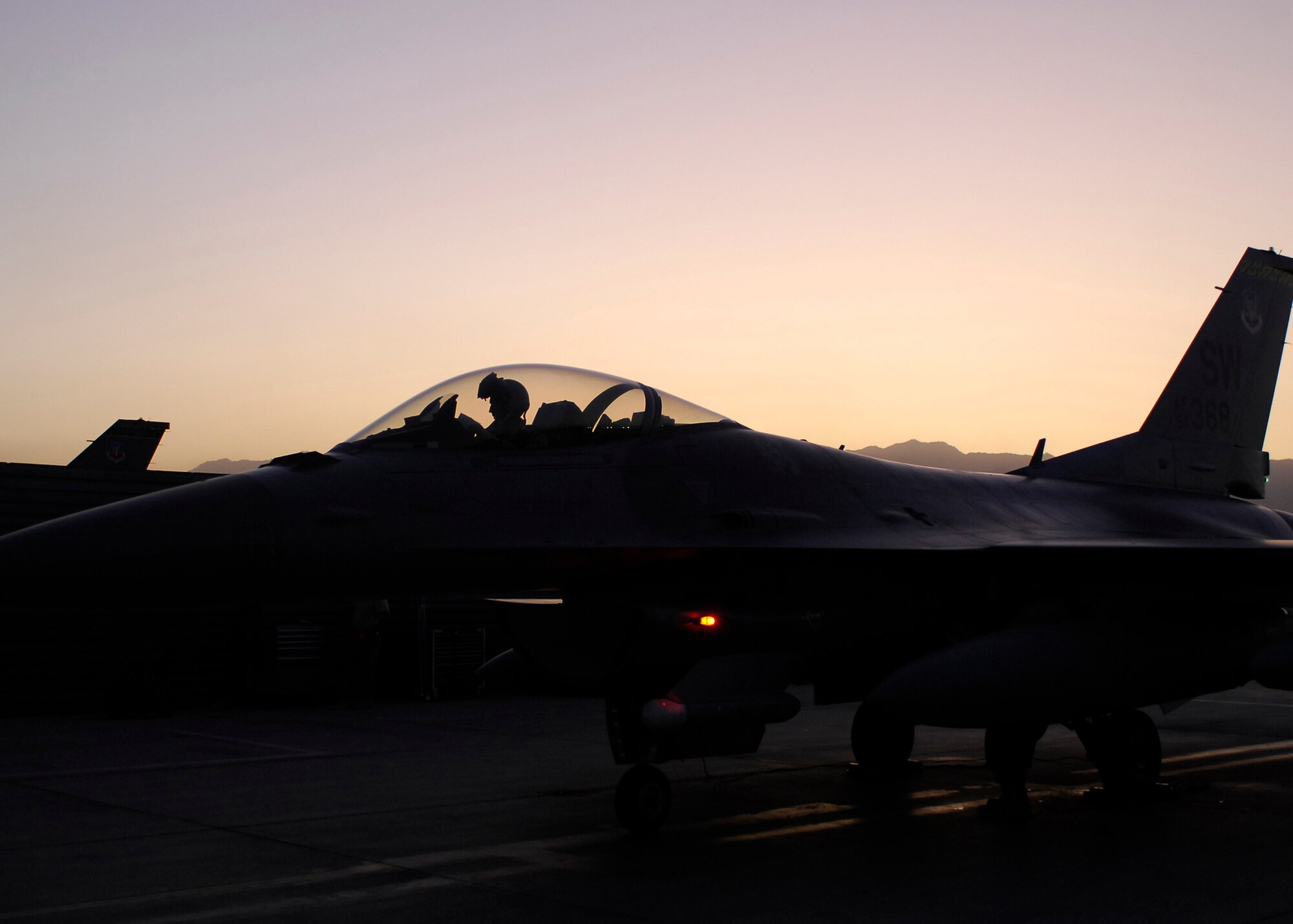 BAGRAM AIRFIELD, Afghanistan -- Captain Brandon Roth, an F-16 Fighting Falcon Pilot from the 79th Expeditionary Fighter Squadron, shuts down the aircraft after landing here, Oct. 11, 2009.  Known as the "Tigers," the F-16s are deployed from the 79th Fighter Squadron out of Shaw Air Force Base, S.C.  The Tigers mission while here is to provide tactical air-to-air and air-to-ground support while supporting Operation Enduring Freedom.  Captain Roth is deployed from Shaw Air Force Base, S.C., and hails from Baltimore, Md.  (U.S. Air Force photo/Senior Airman Felicia Juenke)