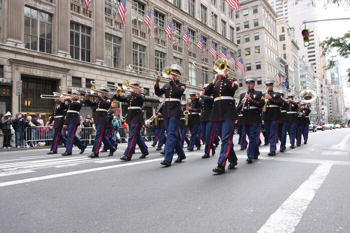 Marines with the Marine Forces Reserve Ceremonial Band from New Orleans perform at the 65th Annual Columbus Day Parade in New York City, Oct. 12, 2009. Thousands cheered as the band played patriotic musical selections while marching up Fifth Avenue. (Official Marine Corps photo by Cpl Clifton D. Sams)::r::::n::::r::::n::