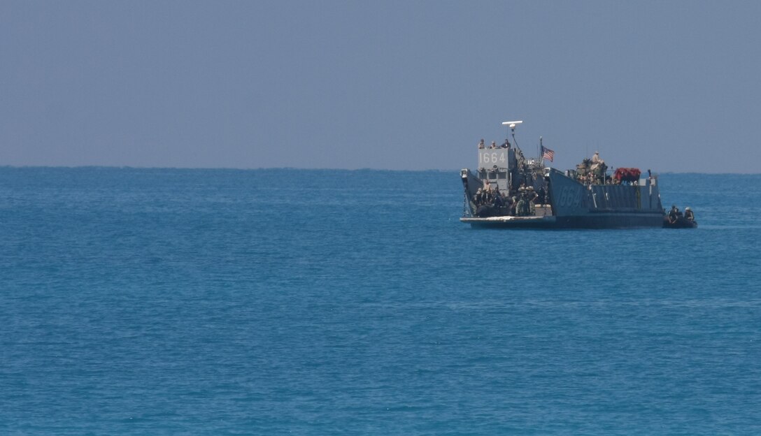 Egyptian special forces prepare to launch their Zodiac speed boats from an American landing craft utility (LCU) during an amphibious assault demonstration conducted as part of Bright Star 2009 in Egypt Oct. 12, 2009. The multinational exercise is designed to improve readiness, interoperability, strengthen the military and professional relationships among U.S., Egyptian and participating forces. Bright Star is conducted by U.S. Central Command and held every two years. ::r::::n::(Official Marine Corps photo by Staff Sgt. Matt Epright)::r::::n::