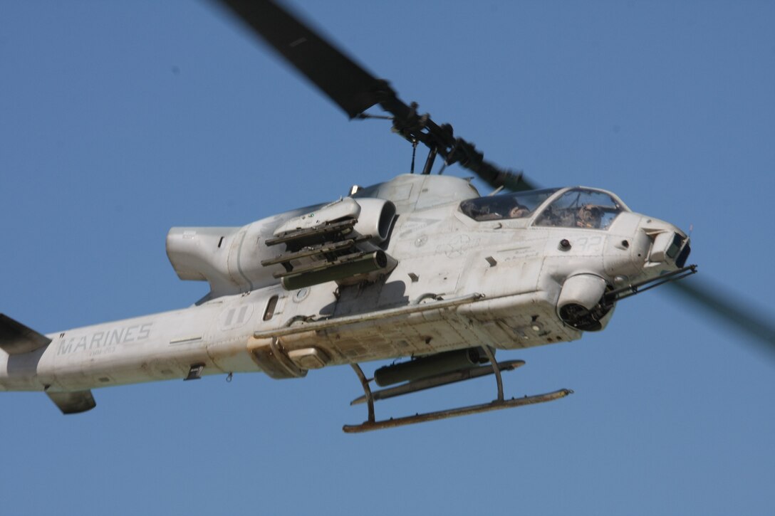 An AH-1W Super Cobra from Marine Medium Tiltrotor Squadron (VMM) 263 (Reinforced), 22nd Marine Expeditionary Unit (MEU), provides close air-support for multinational landing forces during an amphibious assault demonstration conducted as part of Bright Star 2009 in Egypt Oct. 12, 2009. The multinational exercise is designed to improve readiness, interoperability, strengthen the military and professional relationships among U.S., Egyptian and participating forces. Bright Star is conducted by U.S. Central Command and held every two years. Elements of the 22nd MEU are currently are participating in the multi-national exercise while serving as the theater reserve force for U.S. Central Command. ::r::::n::(Official Marine Corps photo by Staff Sgt. Matt Epright)::r::::n::