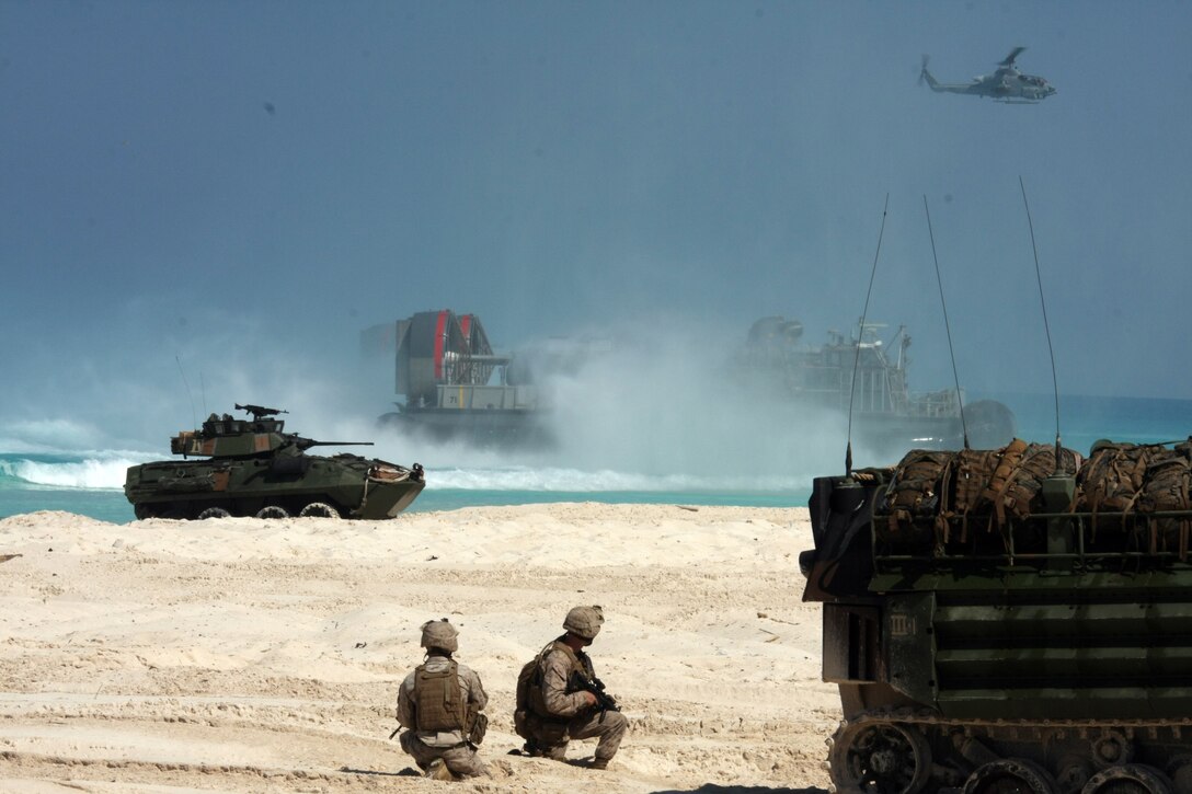 A landing craft, air-cushioned (LCAC) from Assault Craft Unit (ACU) 4 assaults the beach during an amphibious assault demonstration conducted as part of Bright Star 2009 in Egypt Oct. 12, 2009. The multinational exercise is designed to improve readiness, interoperability, strengthen the military and professional relationships among U.S., Egyptian and participating forces. Bright Star is conducted by U.S. Central Command and held every two years. ::r::::n::(Official Marine Corps photo by Staff Sgt. Matt Epright)::r::::n::