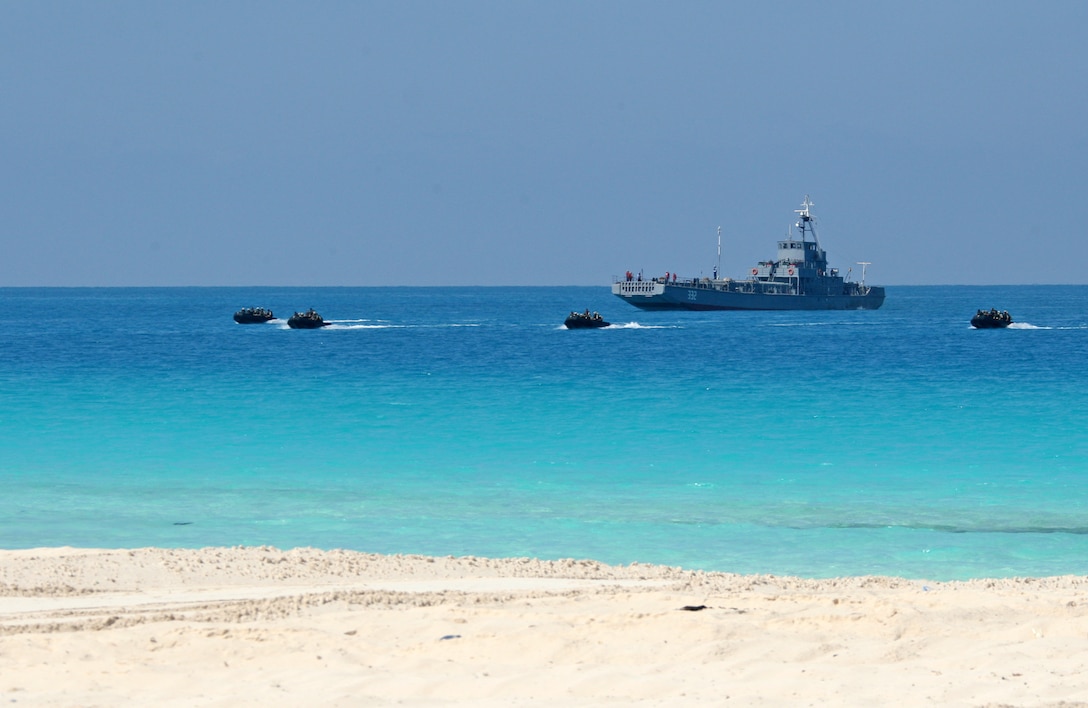 Egyptian special forces motor toward the beach in Zodiac speed boats during an amphibious assault demonstration conducted as part of Bright Star 2009 in Egypt Oct. 12, 2009. The multinational exercise is designed to improve readiness, interoperability, strengthen the military and professional relationships among U.S., Egyptian and participating forces. Bright Star is conducted by U.S. Central Command and held every two years. Elements of the 22nd MEU are currently are participating in the multi-national exercise while serving as the theater reserve force for U.S. Central Command.::r::::n::(Official Marine Corps Photo by Cpl. Theodore W. Ritchie)::r::::n::